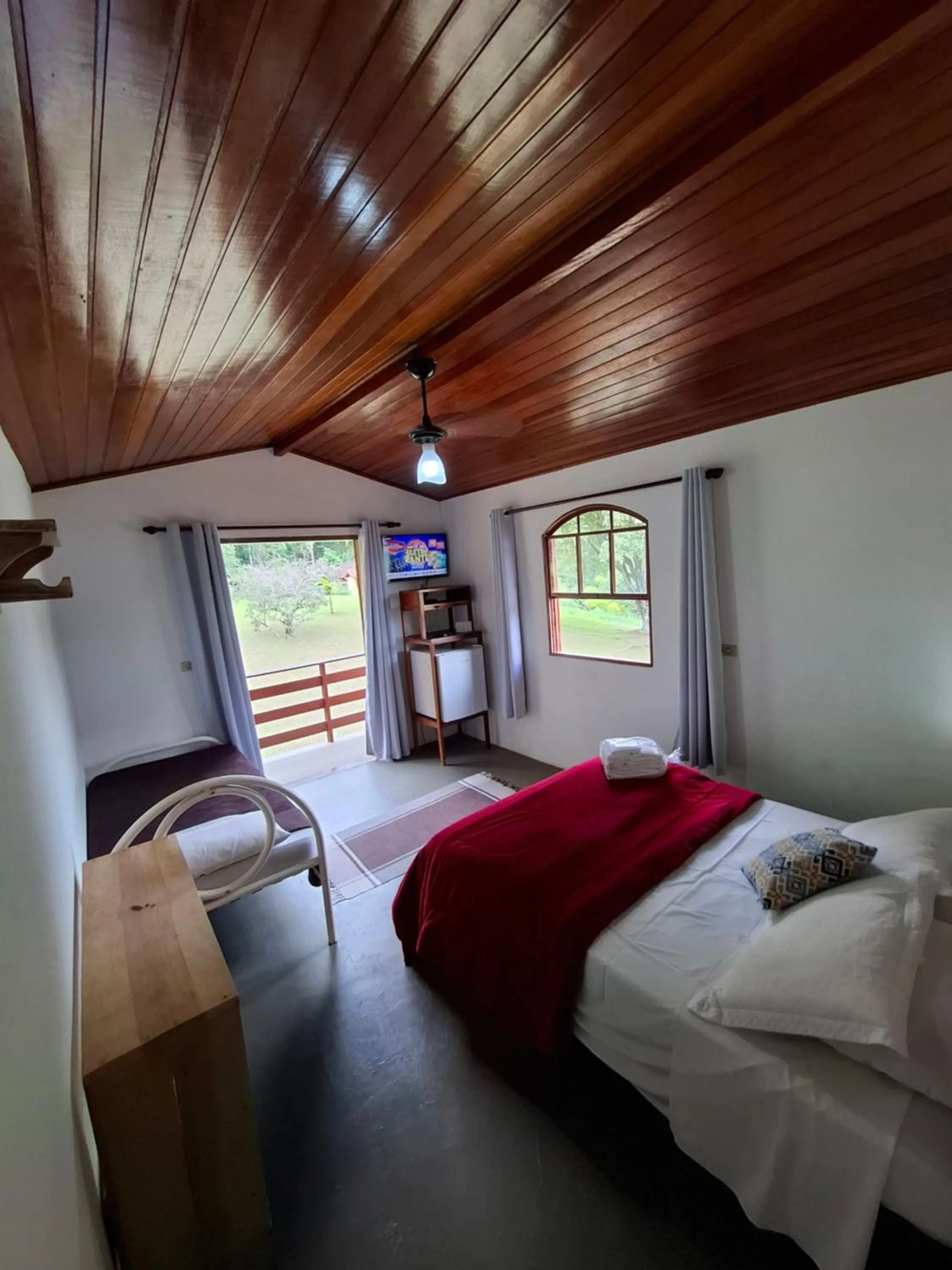 Bed in Pousada Vitória