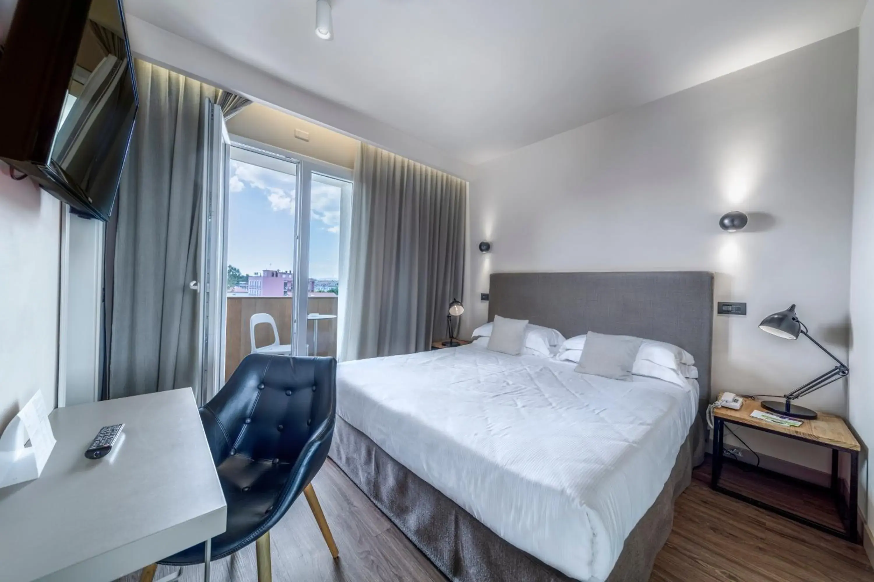 Bed in Hotel Select Suites & Spa - Apartments Bed in Hotel Select Suites & Spa - Apartments