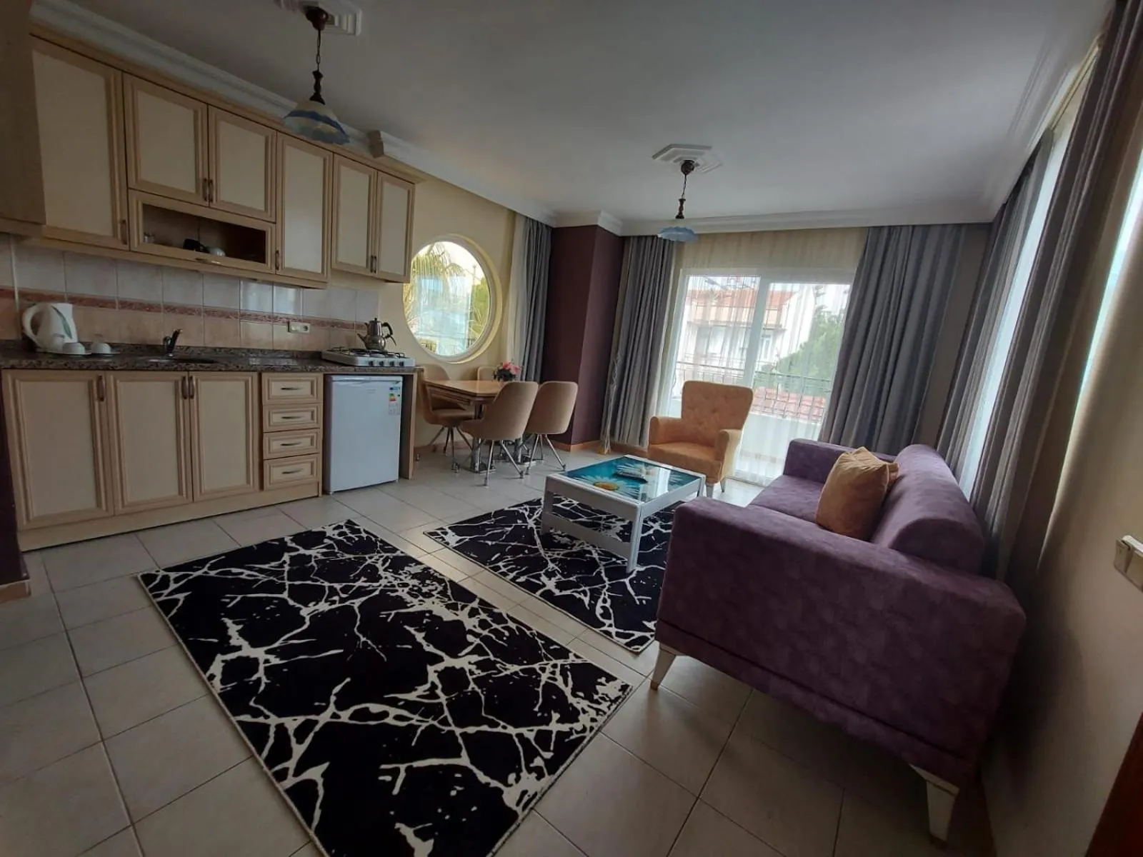 Kitchen or kitchenette in Summer rose hotel