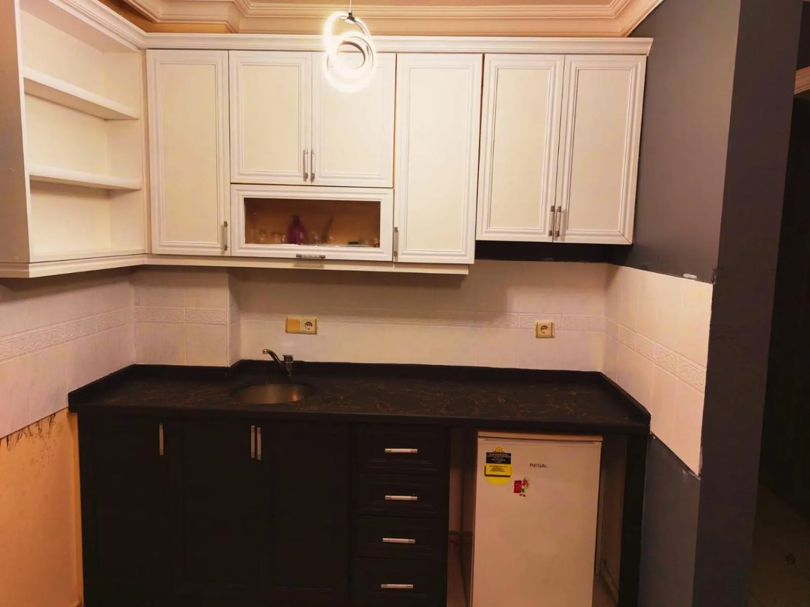 Kitchen or kitchenette in Summer rose hotel