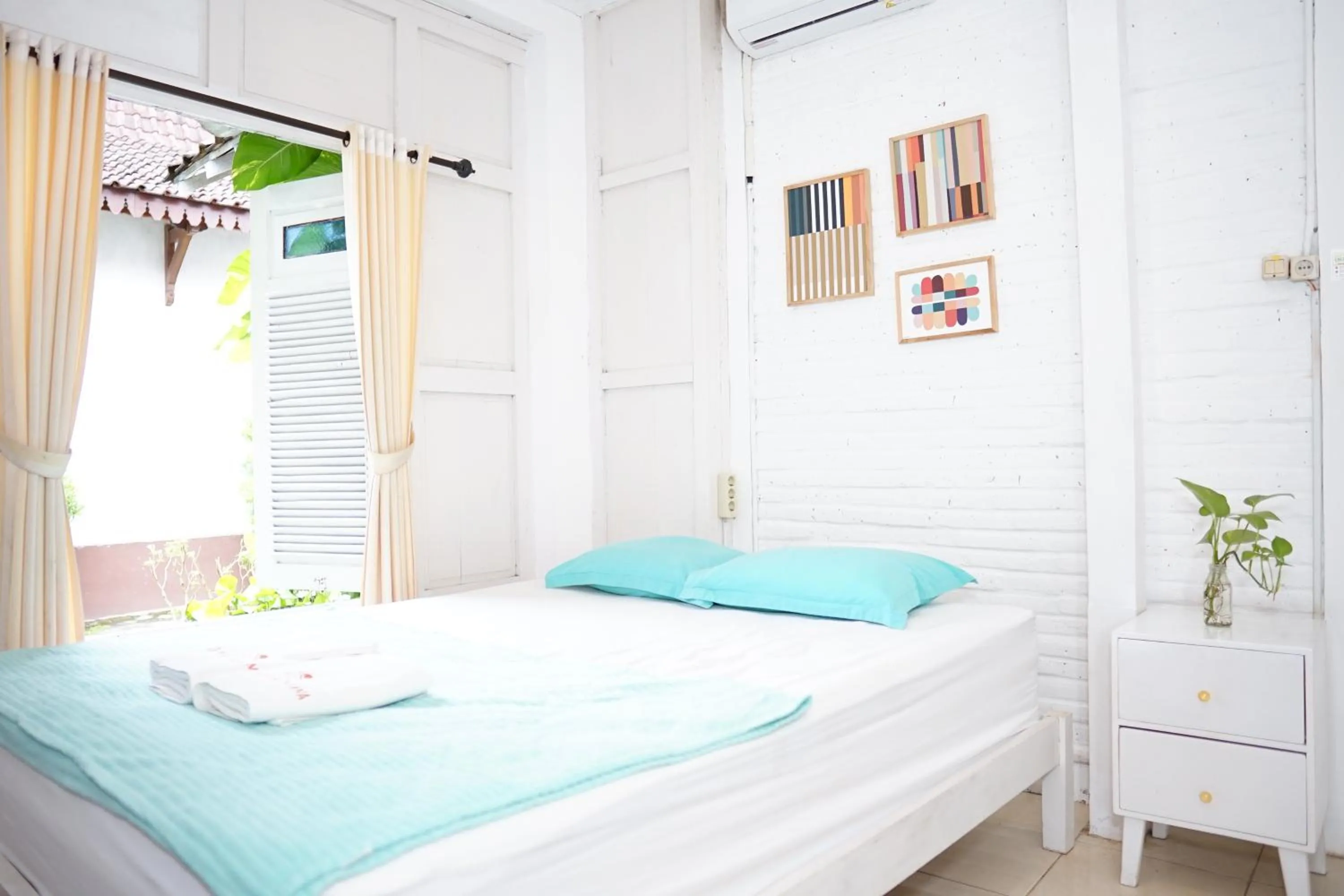 Bed in Roemah Renjana Yogyakarta