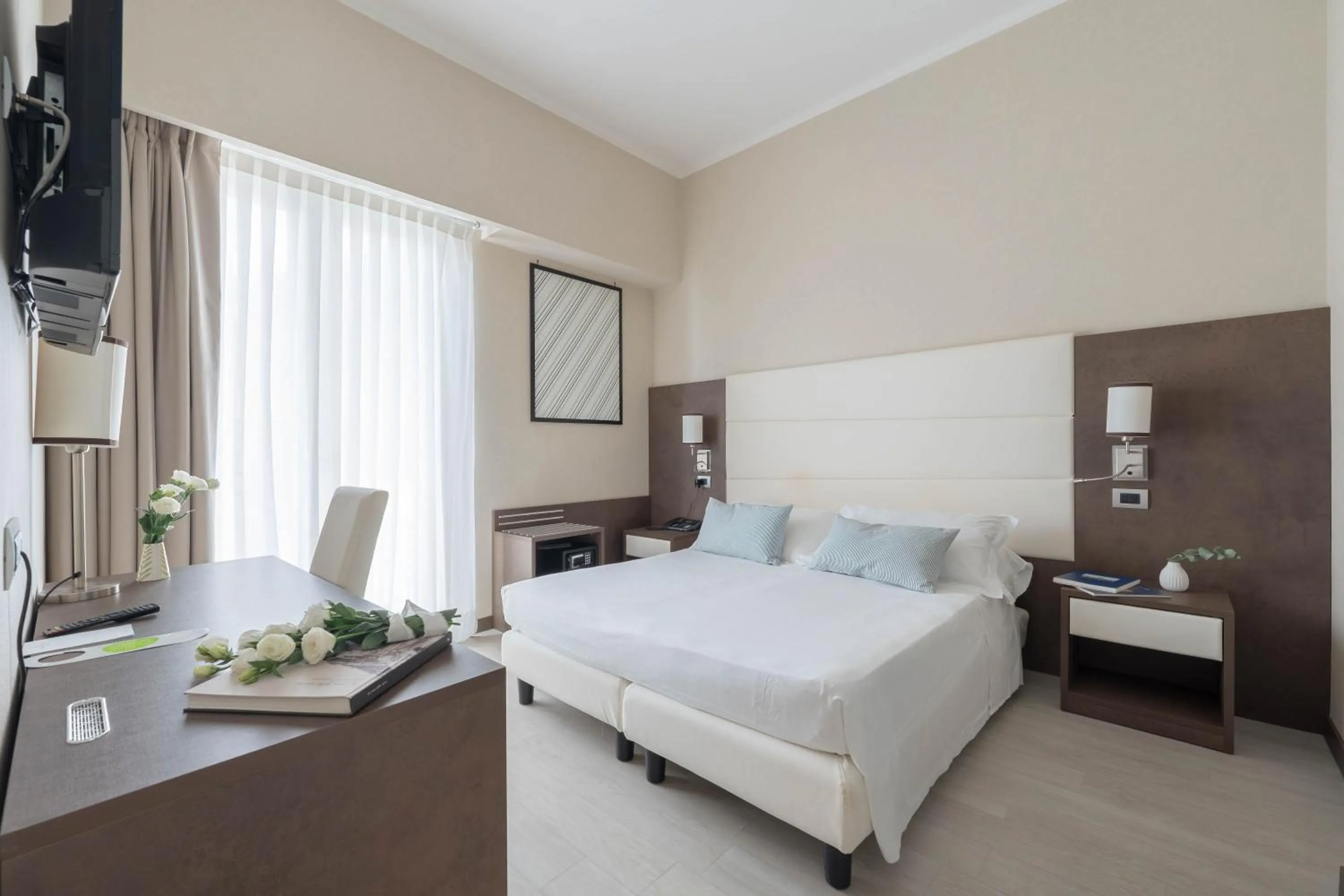 Bed in Reginna Palace Hotel