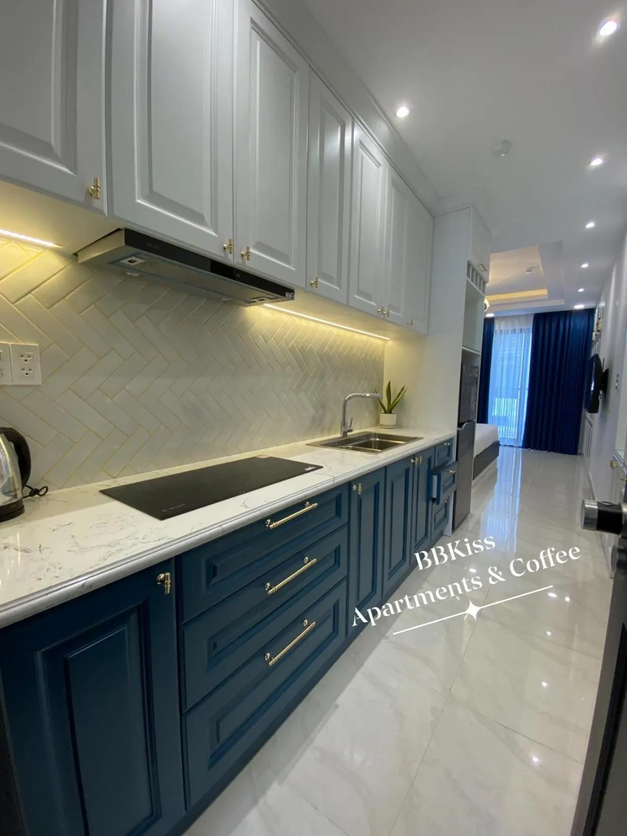 stove in BBKISS Apartments & Hotel