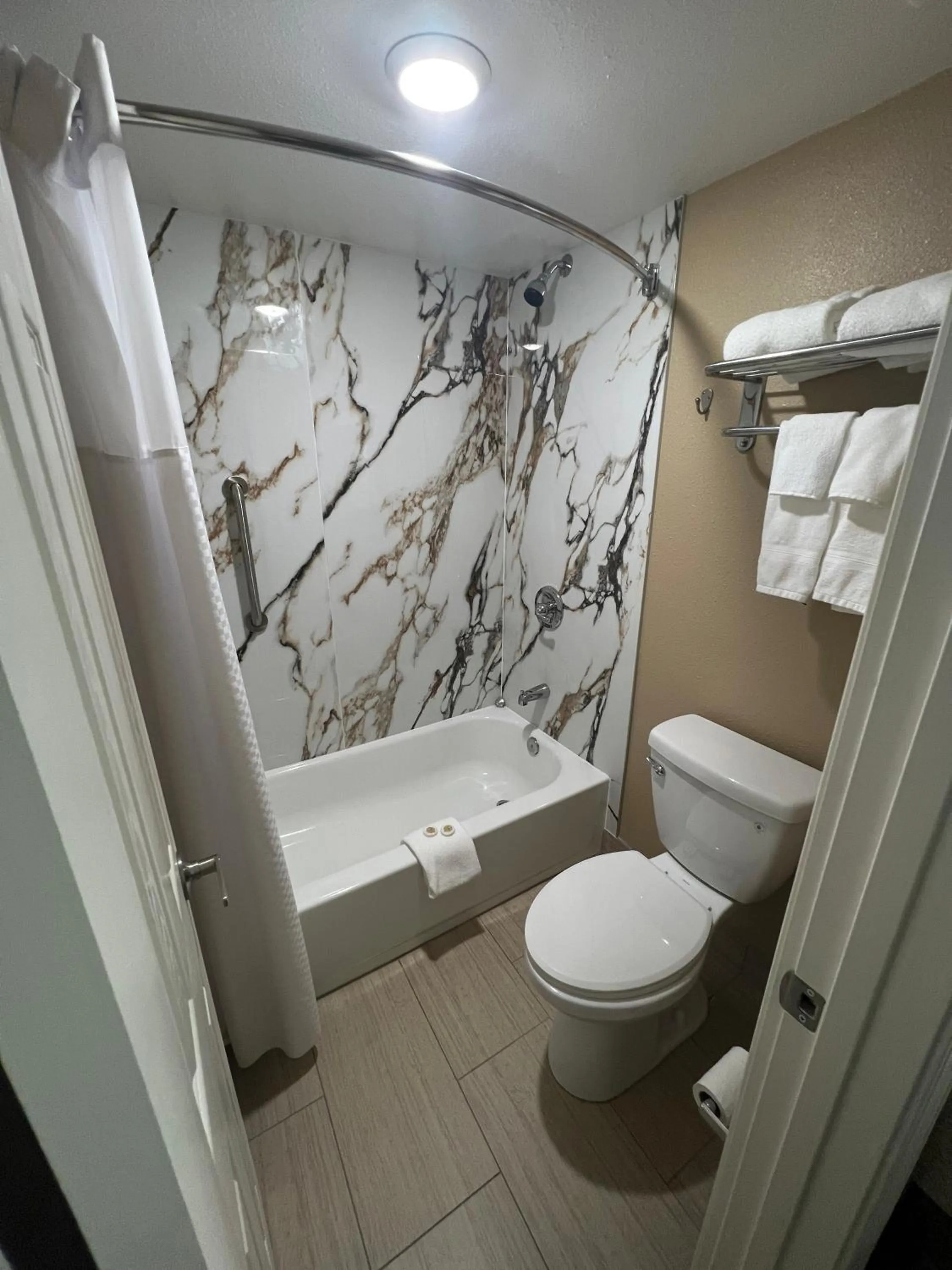 Bathroom in Super 8 by Wyndham Paducah I-24 Exit 4