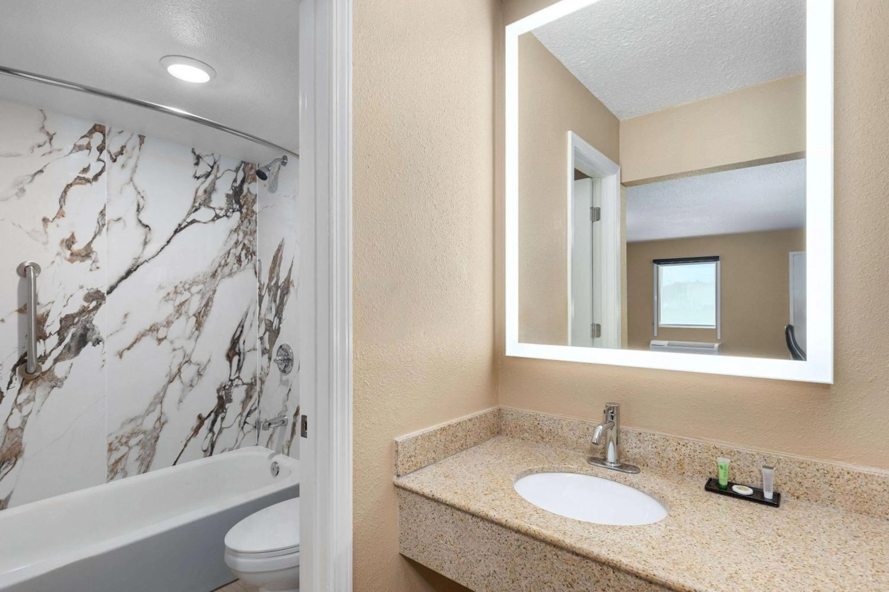 Bathroom in Super 8 by Wyndham Paducah I-24 Exit 4