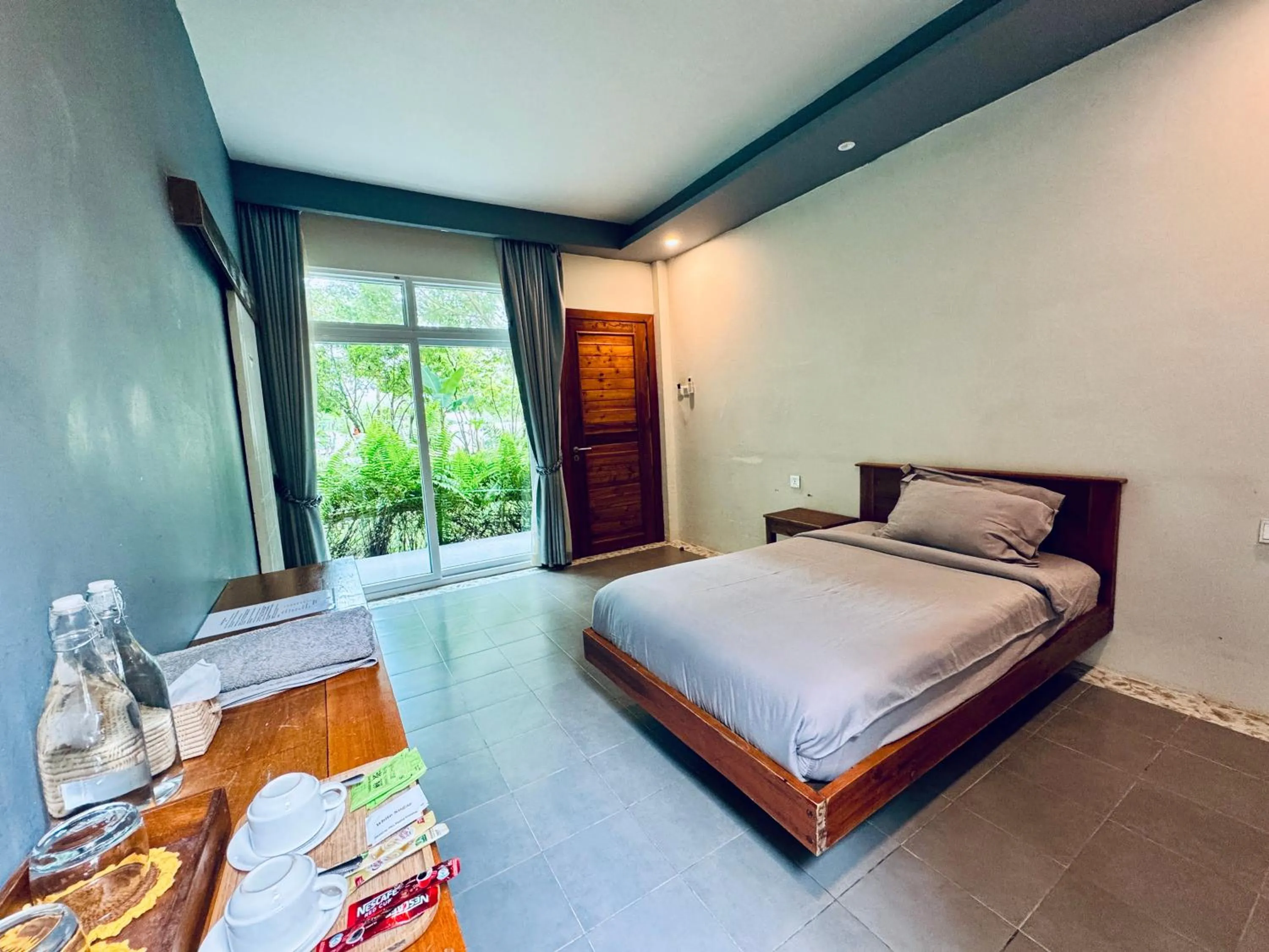 Photo of the whole room, Bed in Kampot Riverfront Boutique
