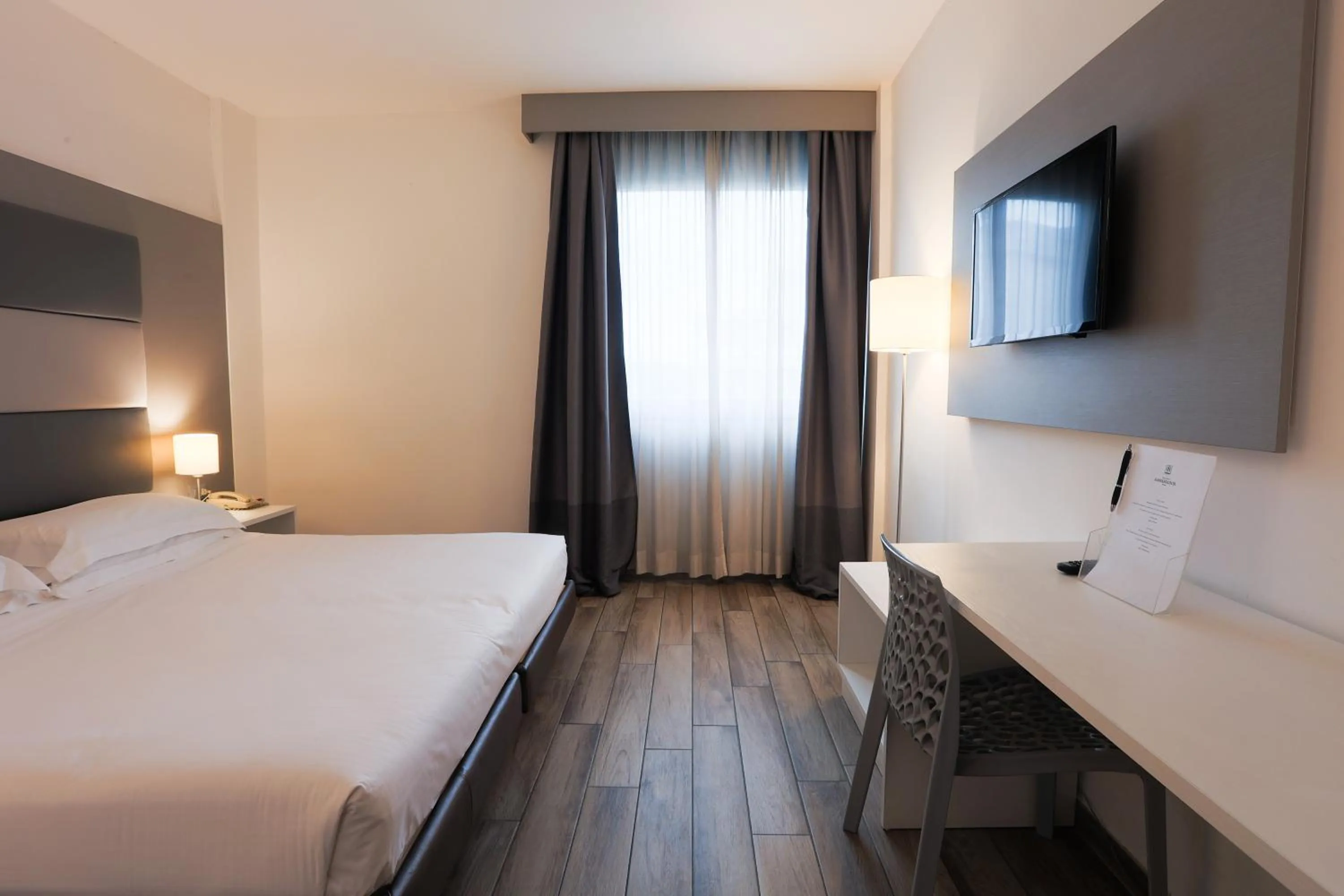 Bed in Toscana Ambassador