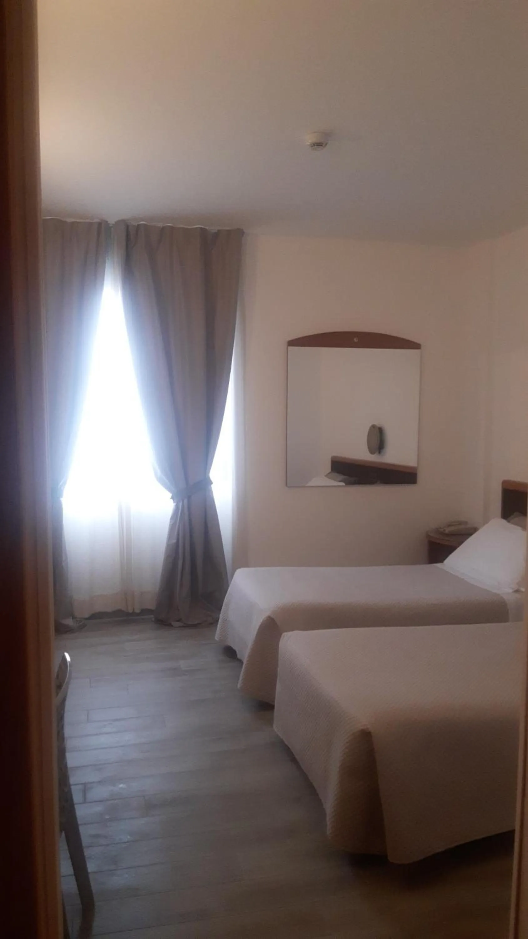 Bed in Toscana Ambassador