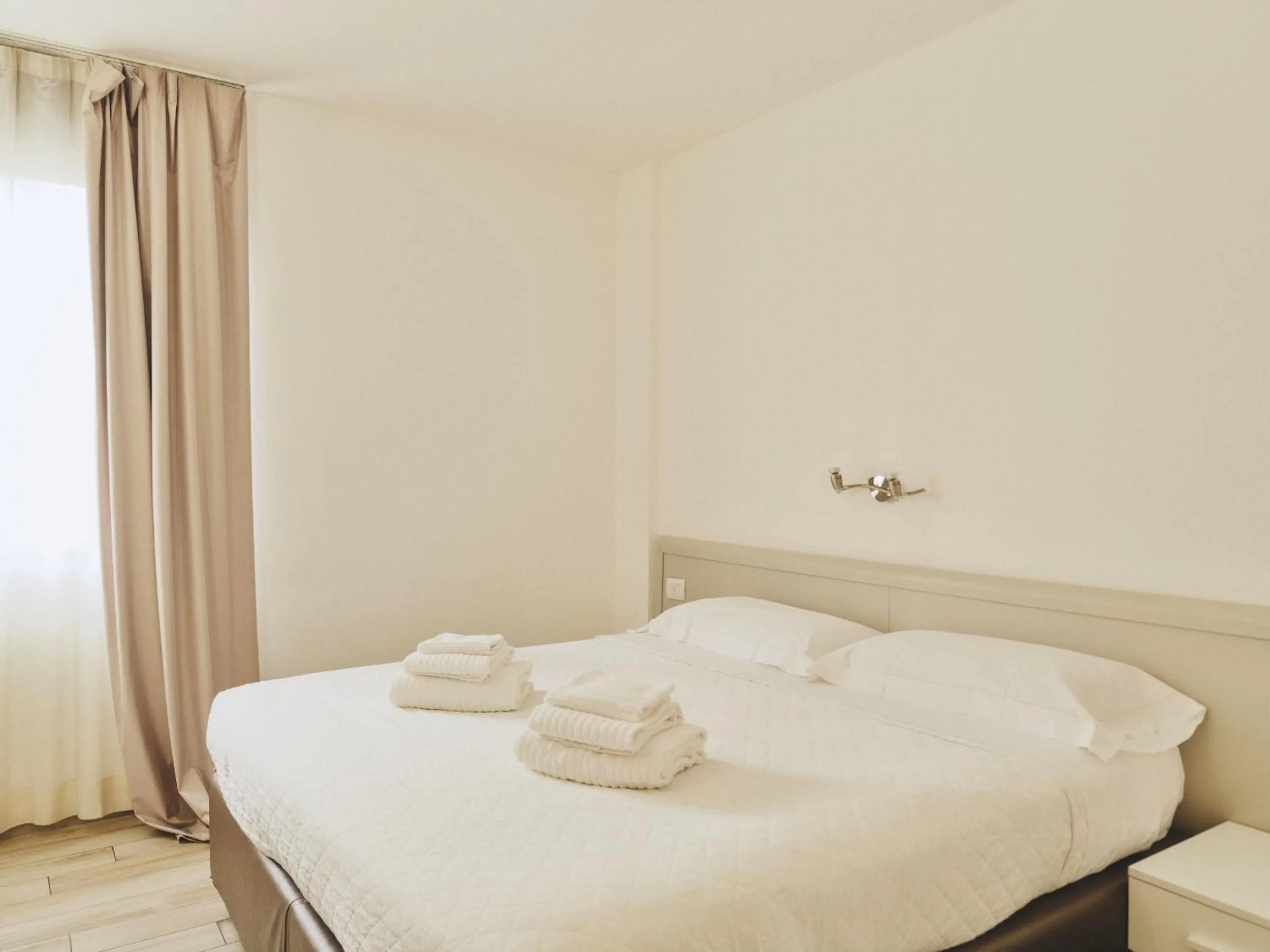 Bed in Toscana Ambassador