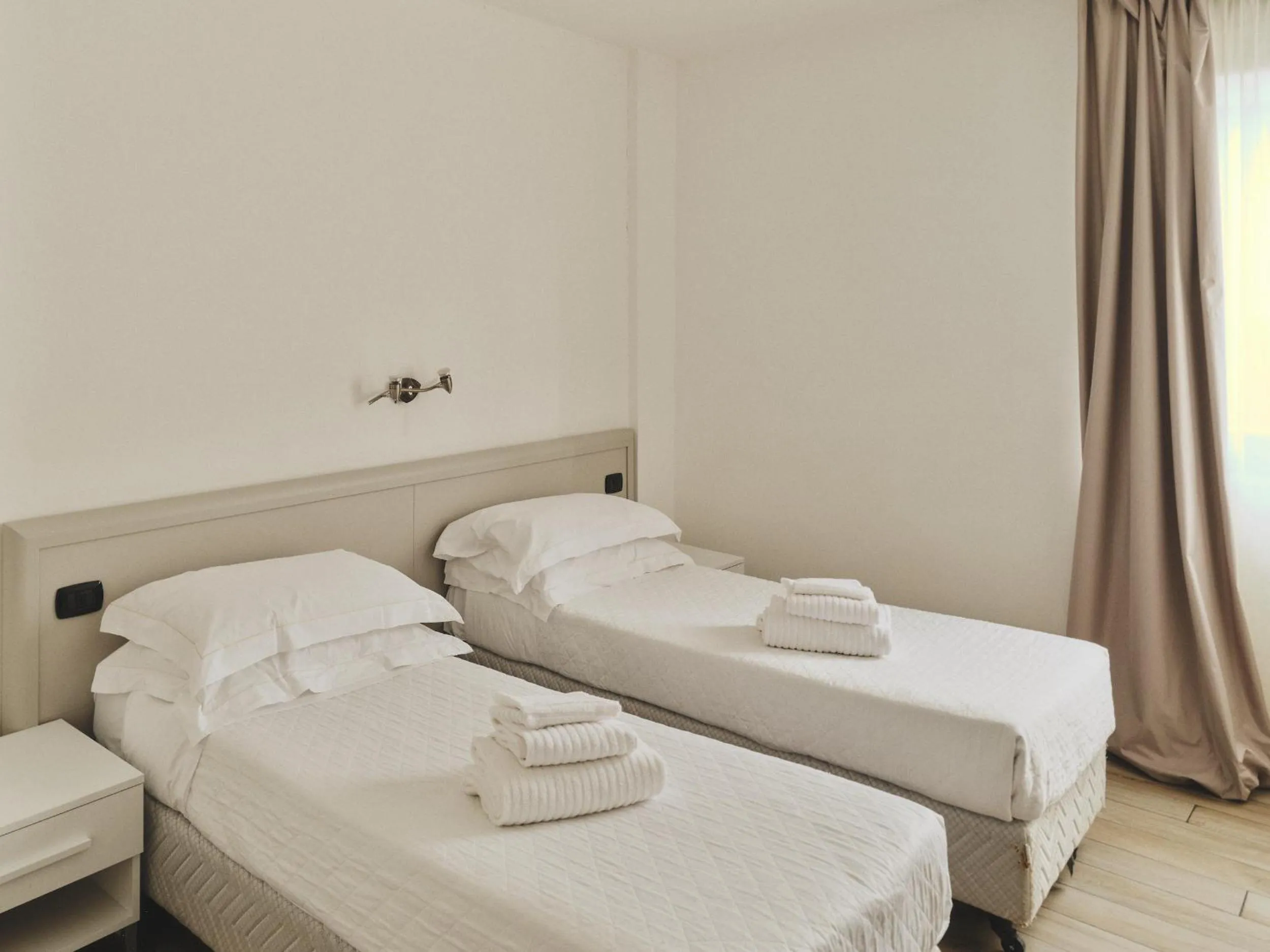 Bed in Toscana Ambassador