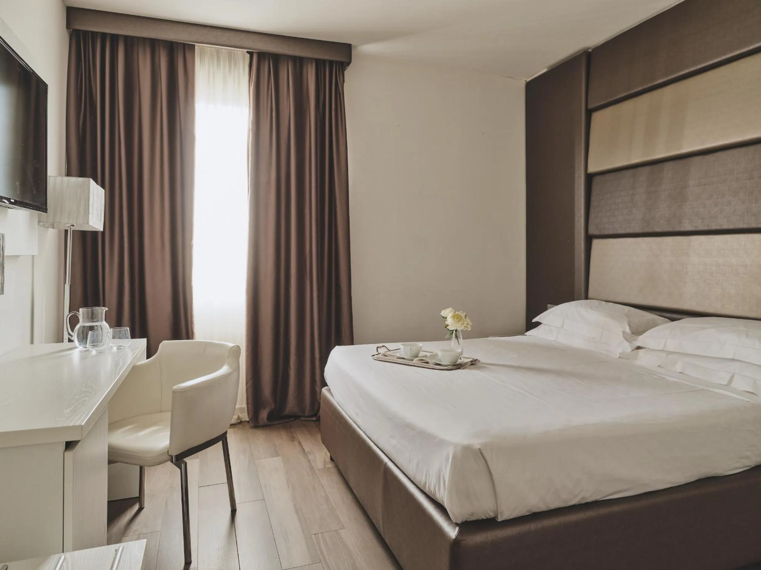 Bed in Toscana Ambassador