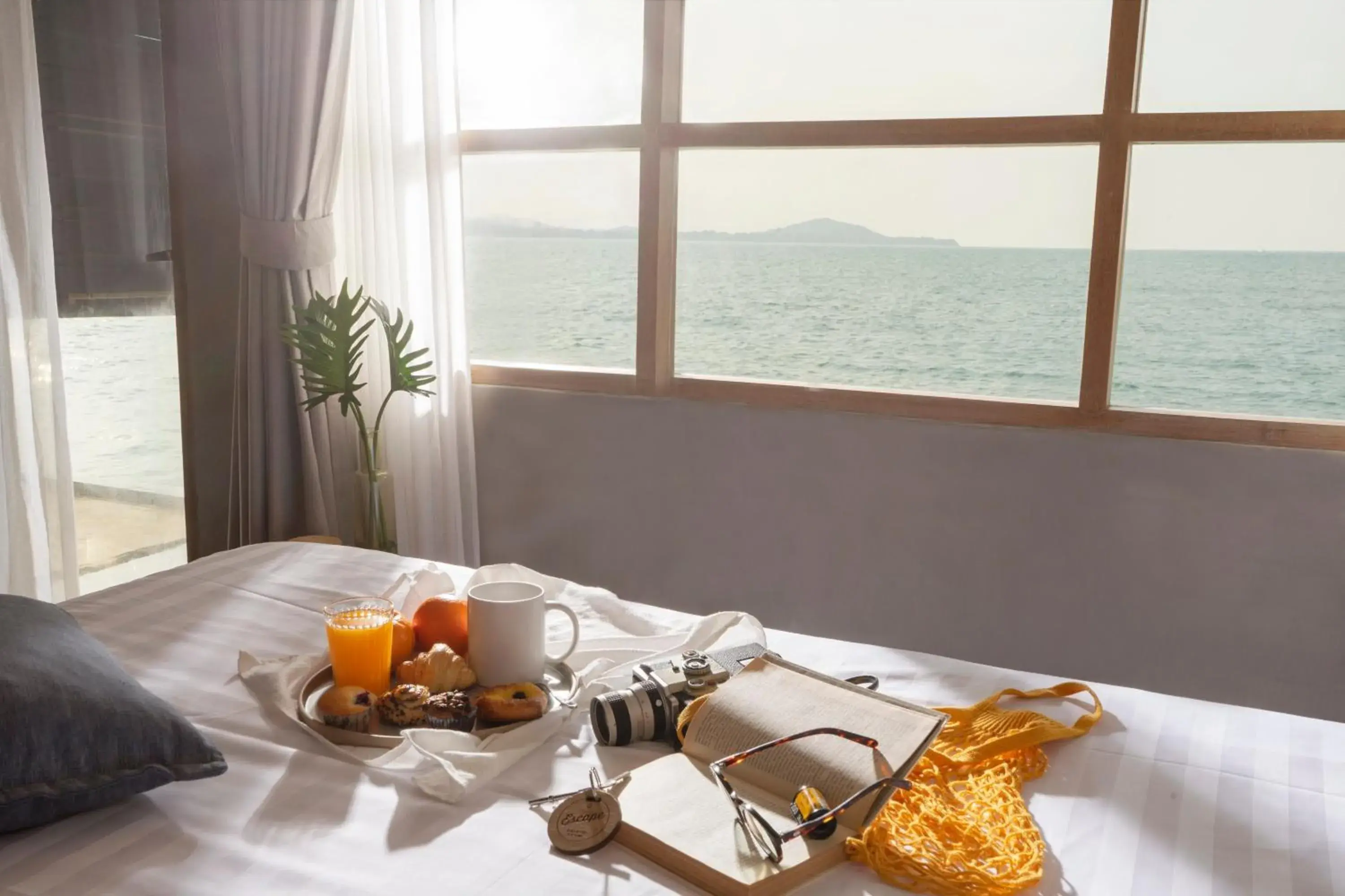 Sea view, Bed in Escape Beach Resort - New Look & Improved Sea view, Bed in Escape Beach Resort - New Look & Improved