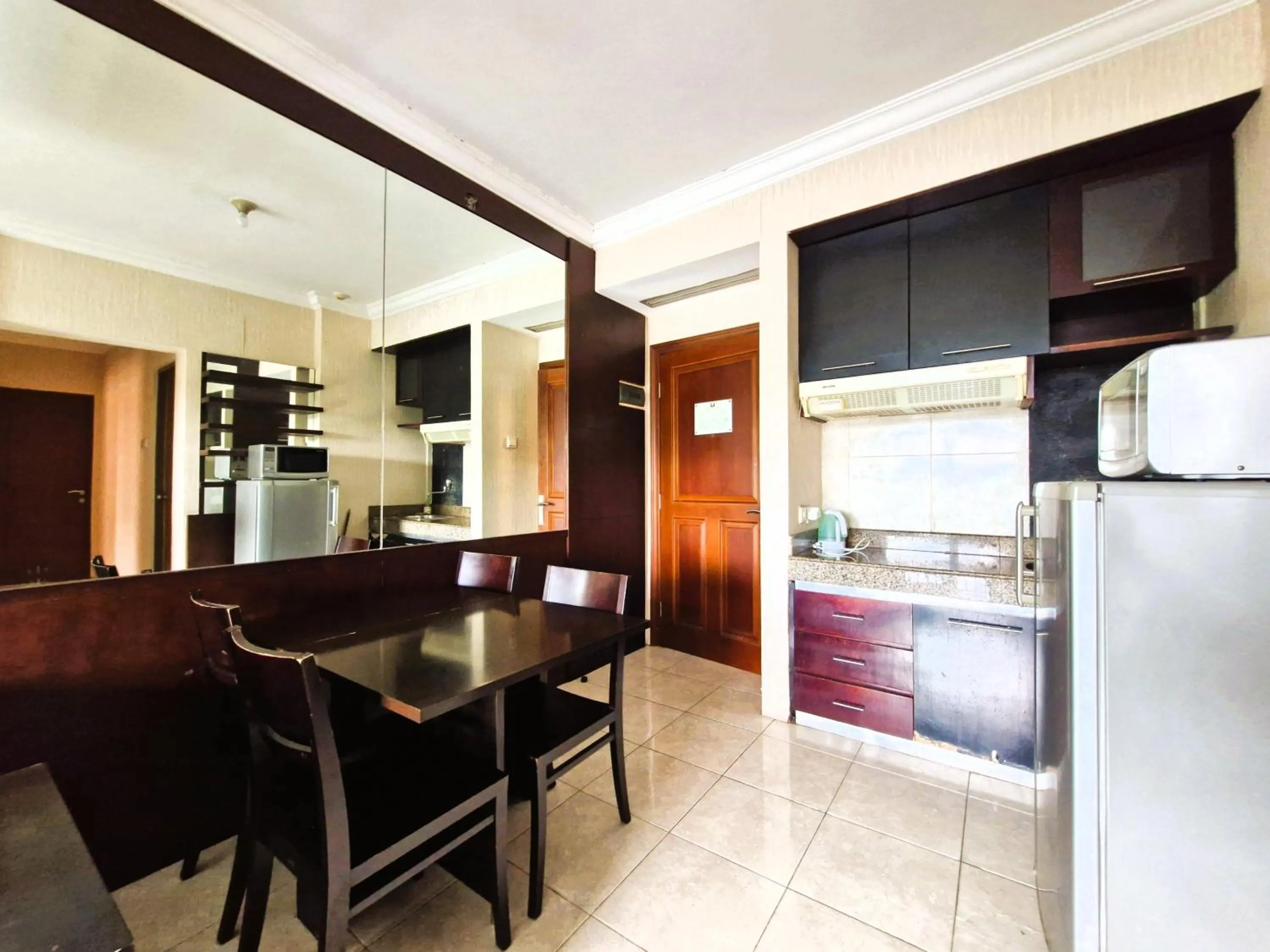 Living room in High Livin Apartment Ciumbuleuit