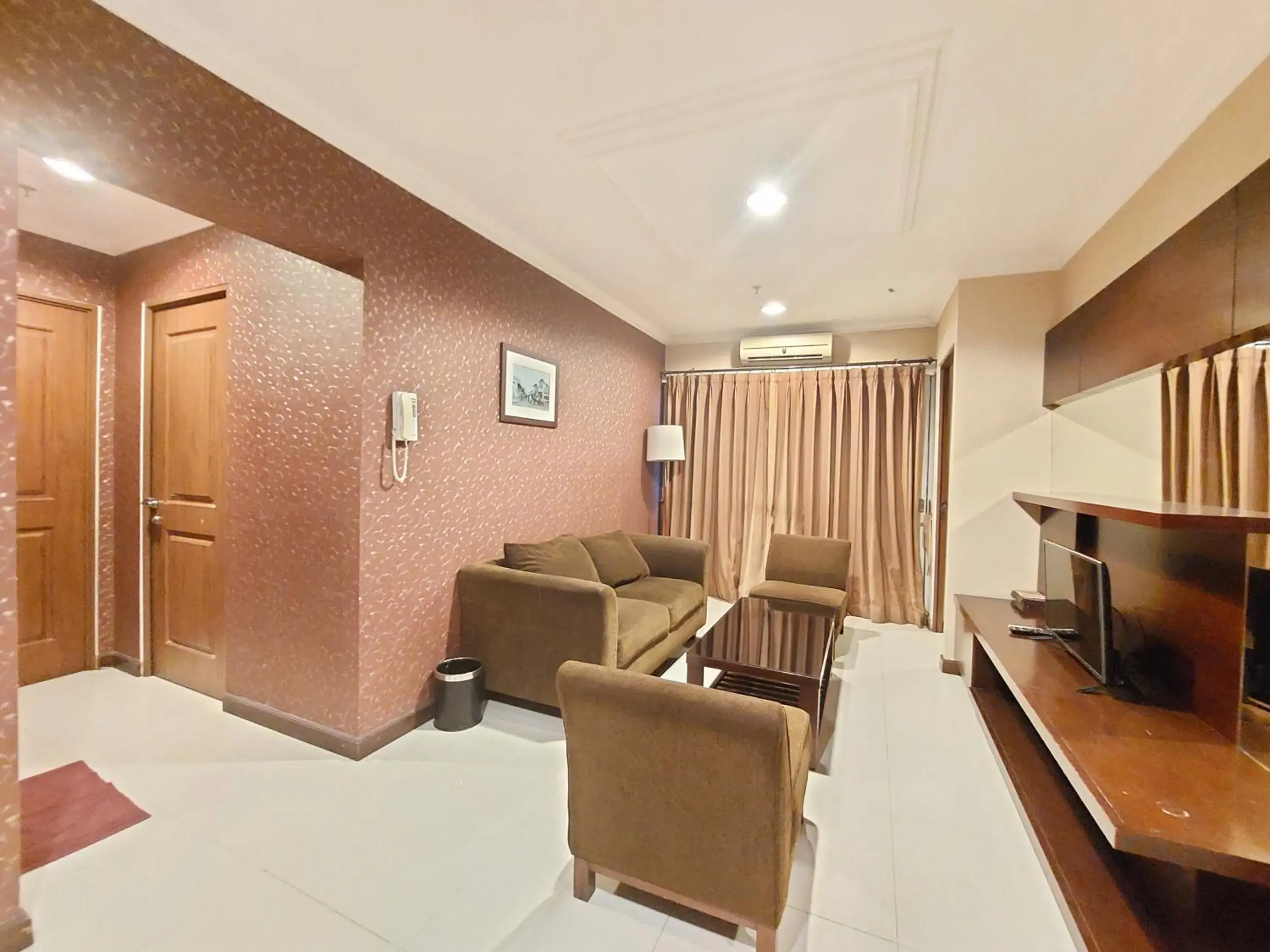 Living room in High Livin Apartment Ciumbuleuit Living room in High Livin Apartment Ciumbuleuit