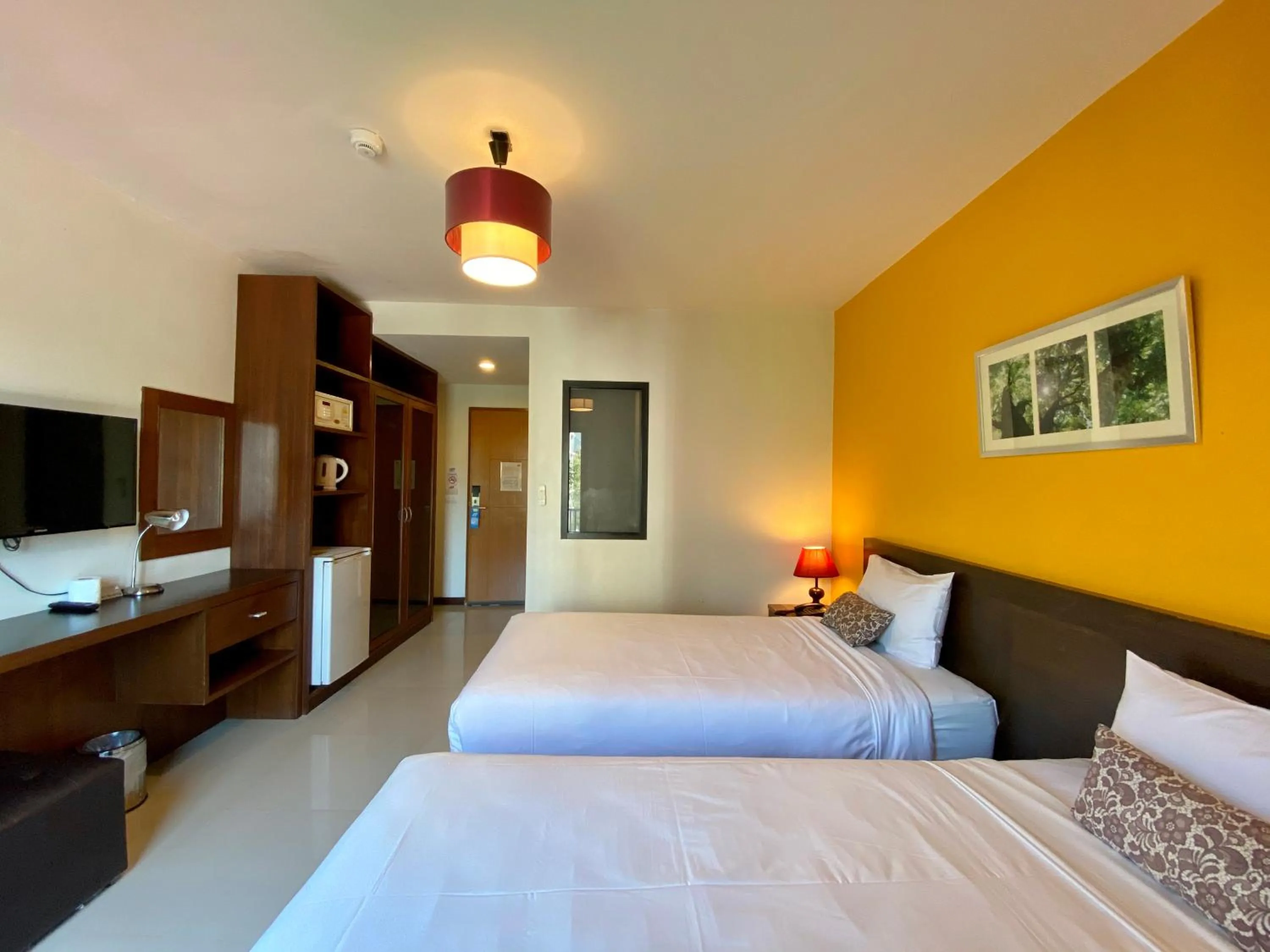 Bed in WE Valley Hotel