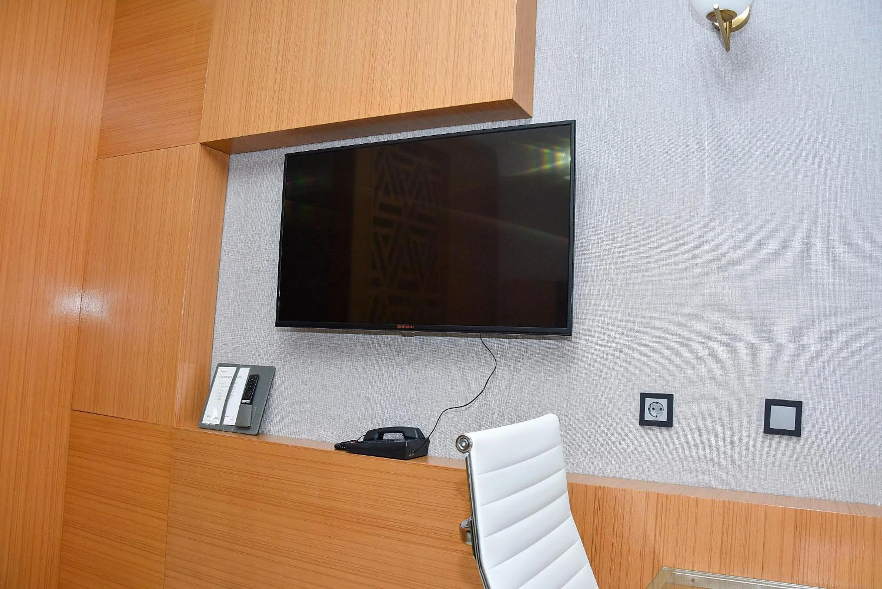 TV and multimedia in Ramada by Wyndham Turkistan
