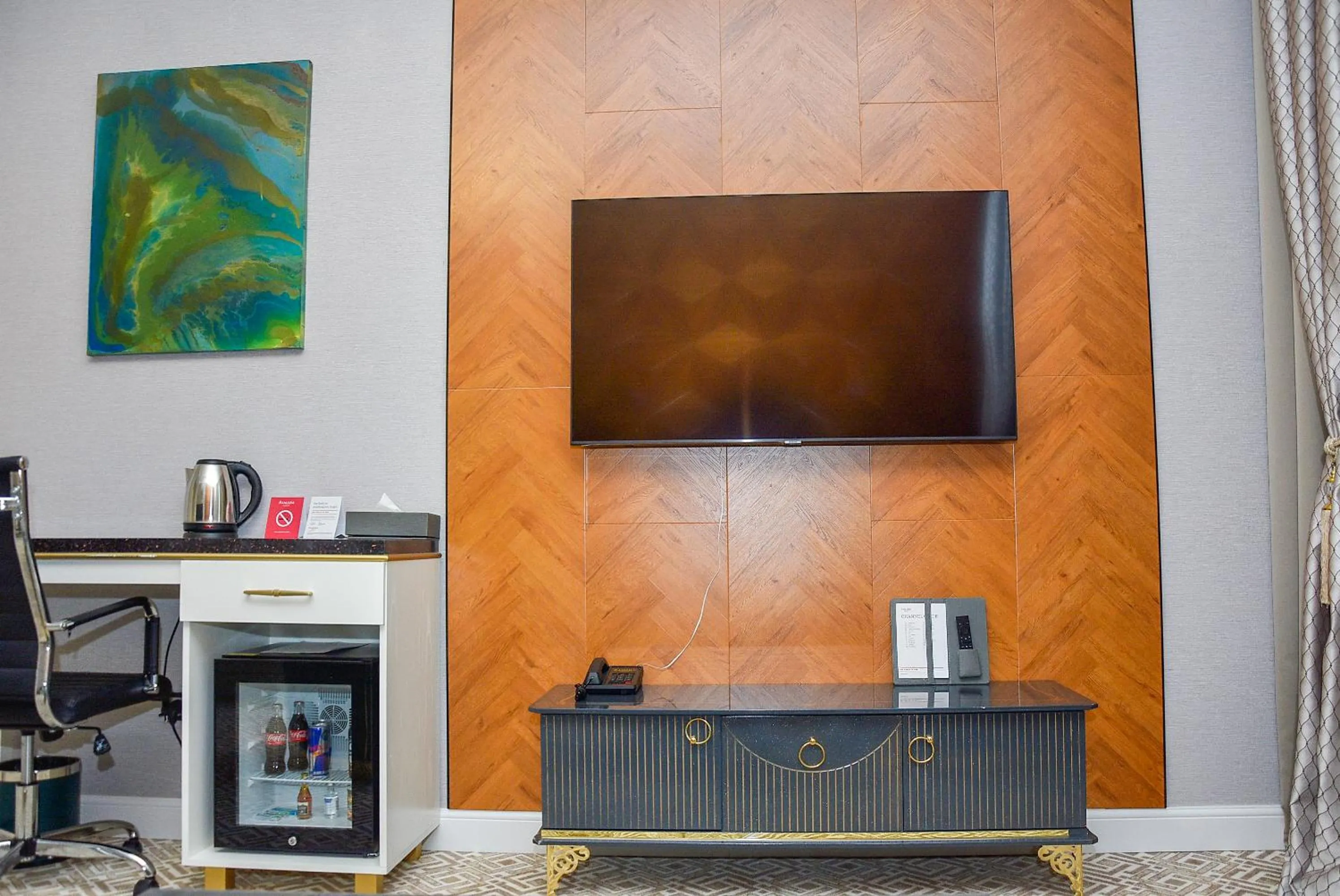 Communal lounge/ TV room in Ramada by Wyndham Turkistan