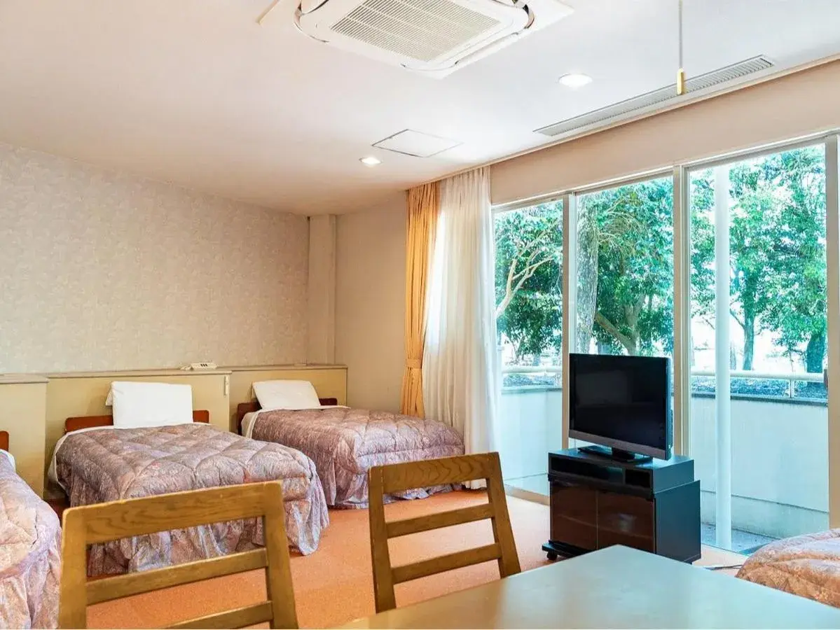 Photo of the whole room, Bed in Seagaia Forest Cottages Photo of the whole room, Bed in Seagaia Forest Cottages