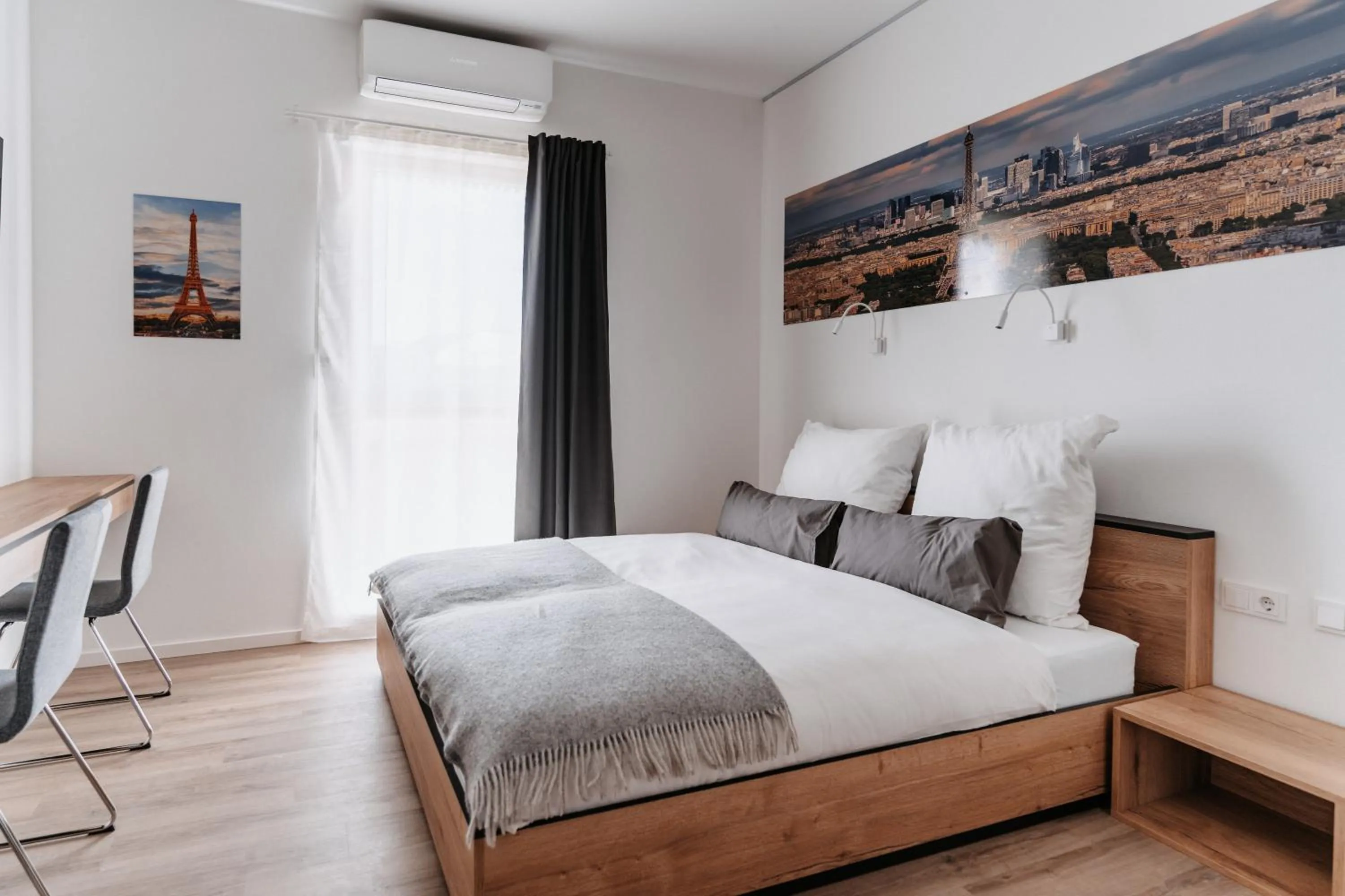 Bed in STEP INN The Fair Hotel