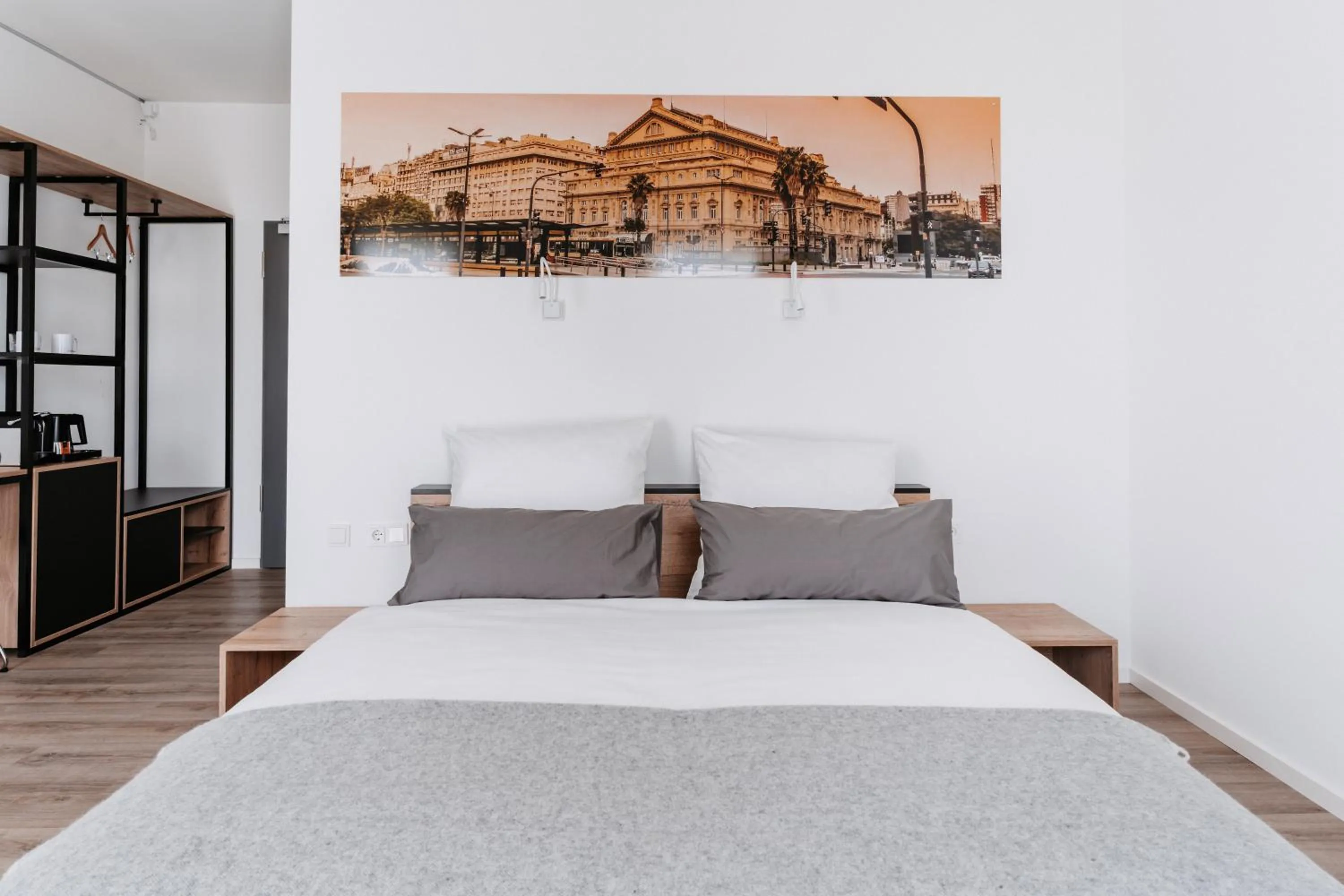 Bed in STEP INN The Fair Hotel