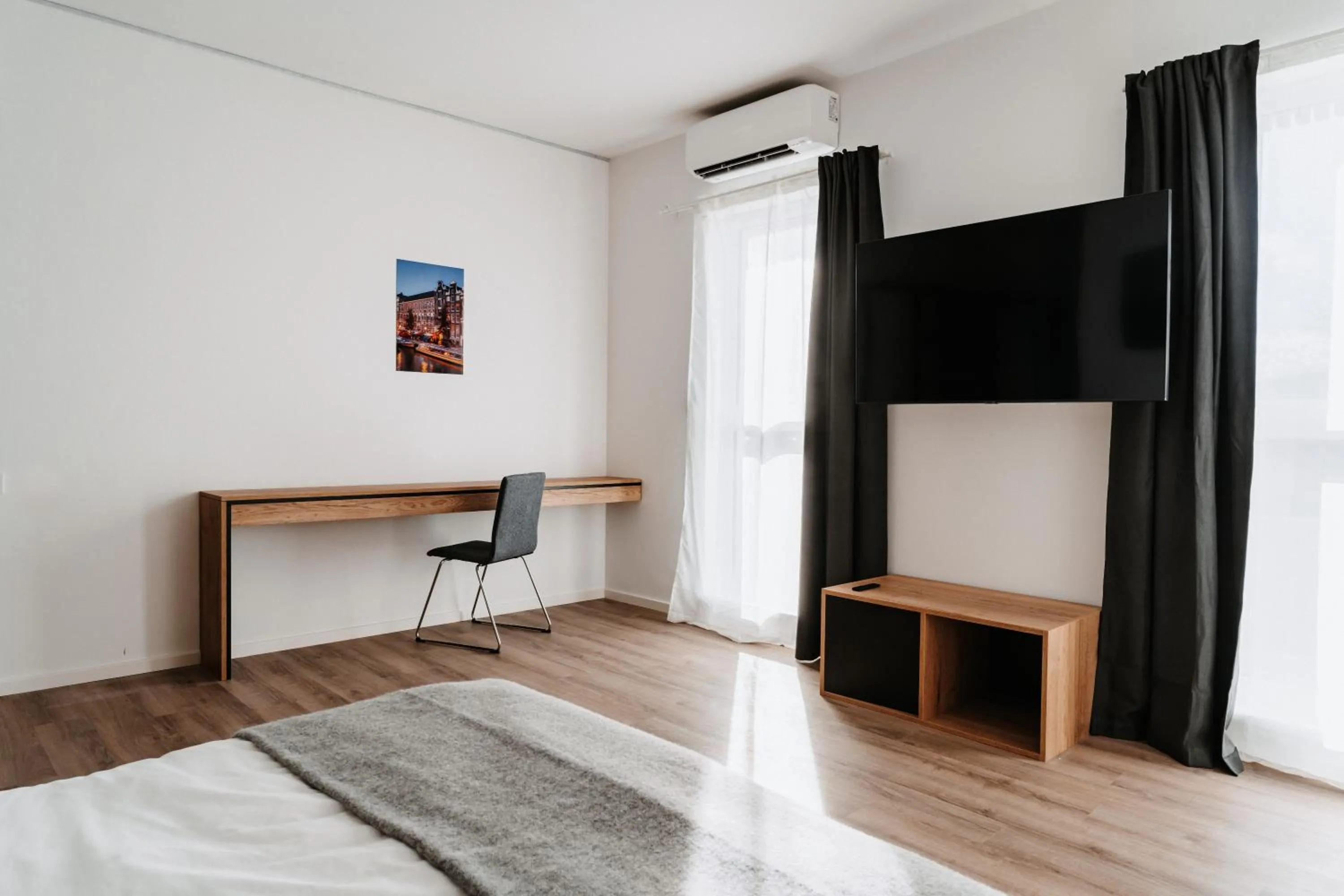 Bed in STEP INN The Fair Hotel