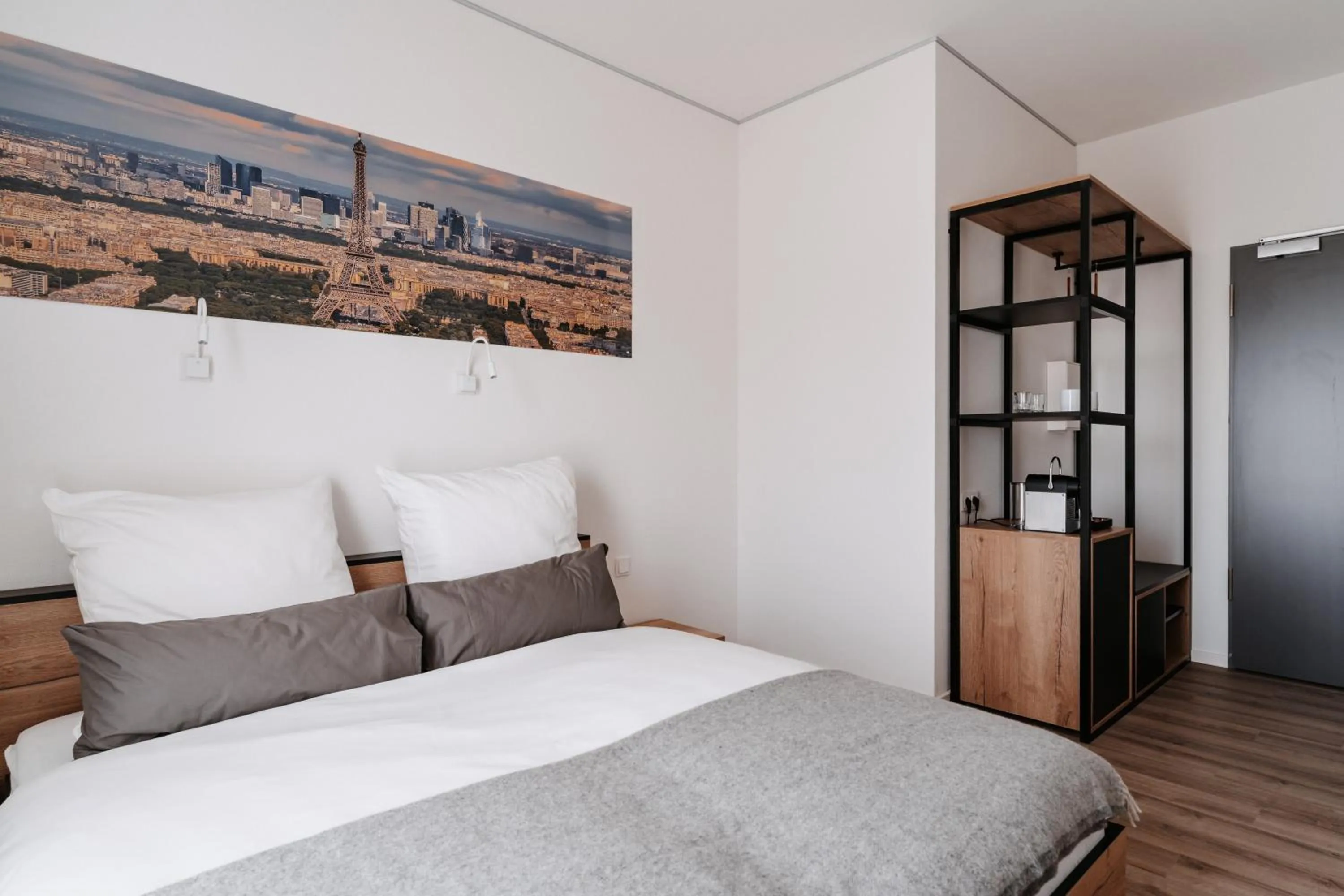 Bed in STEP INN The Fair Hotel