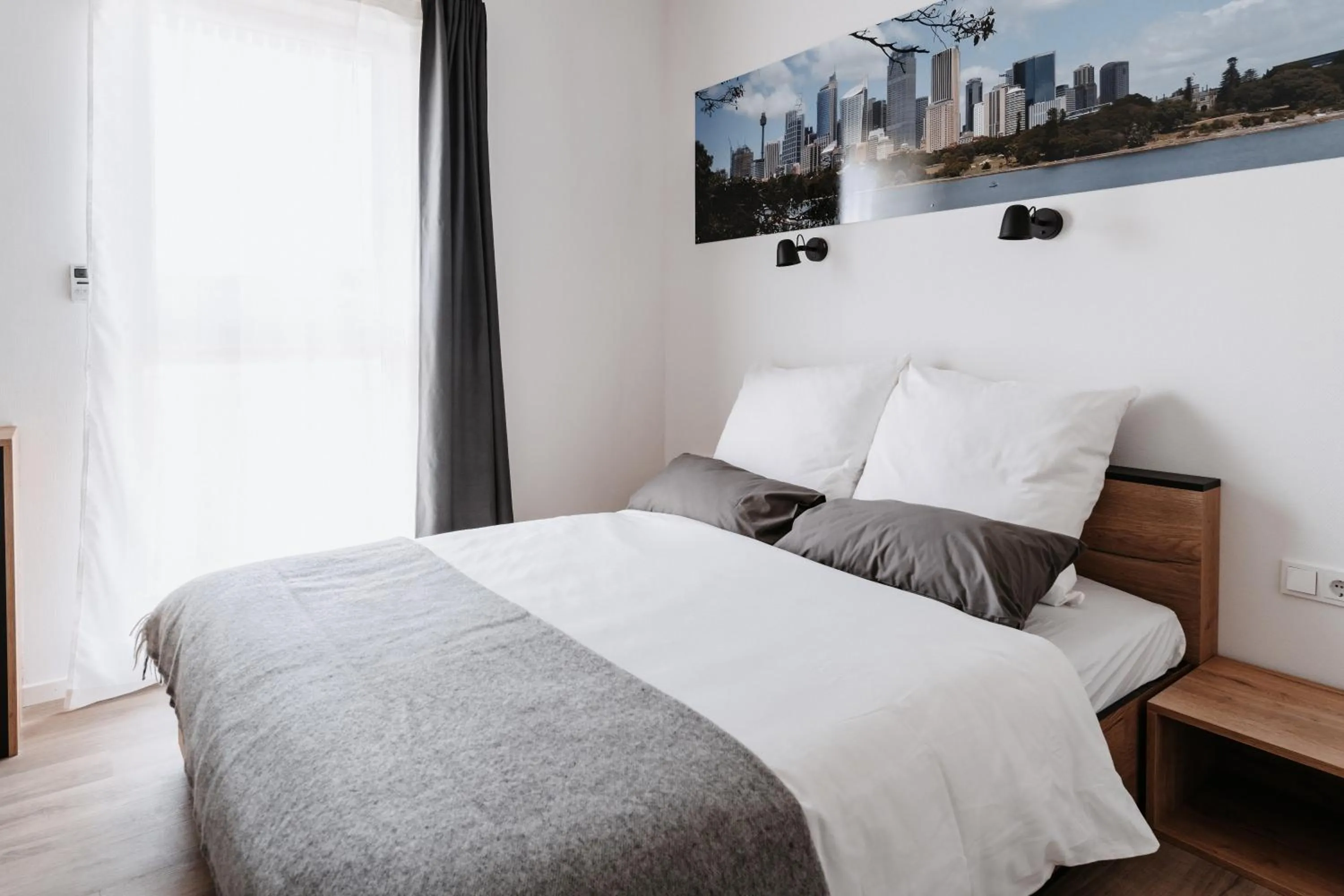 Bed in STEP INN The Fair Hotel