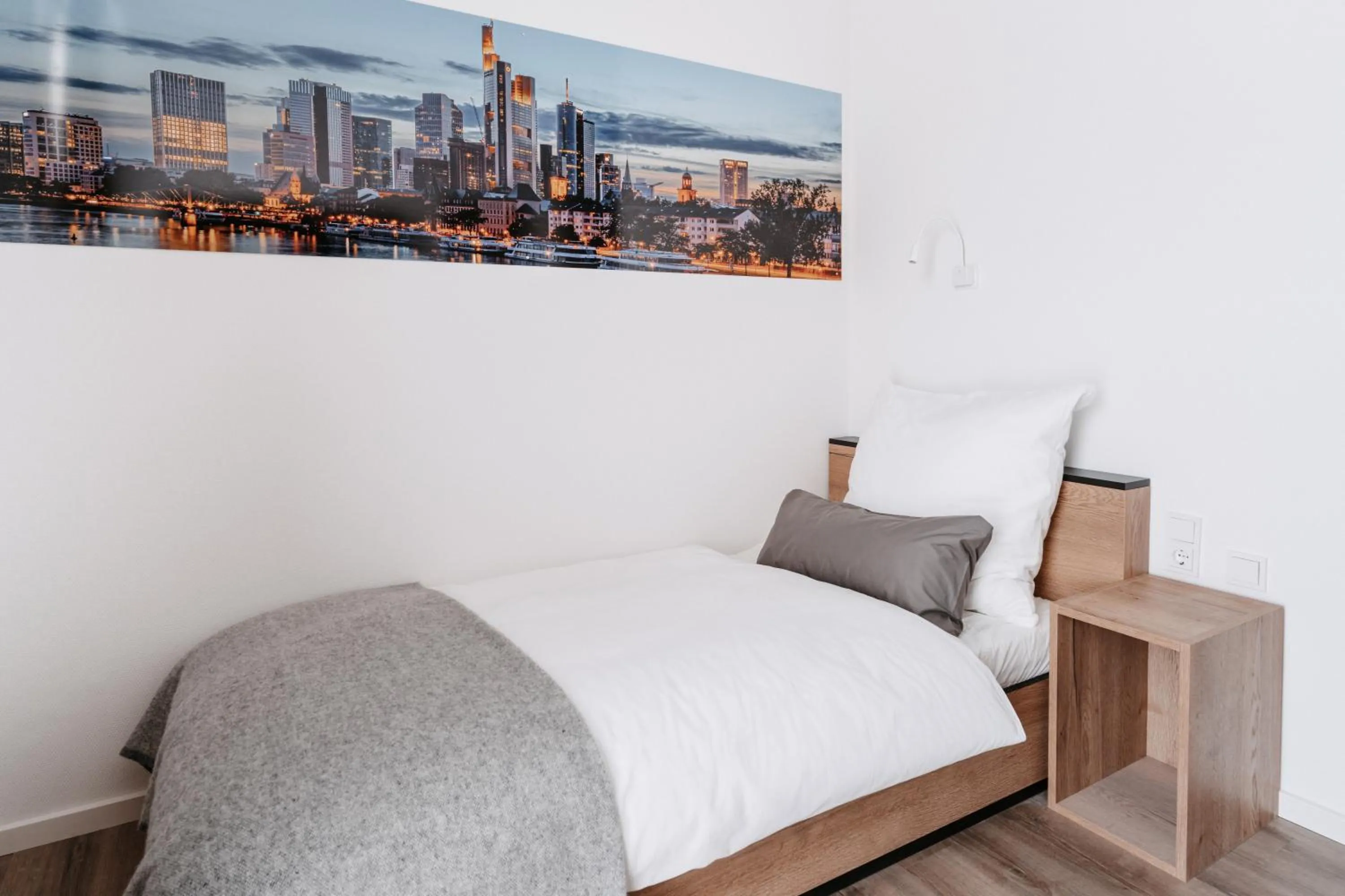 Bed in STEP INN The Fair Hotel