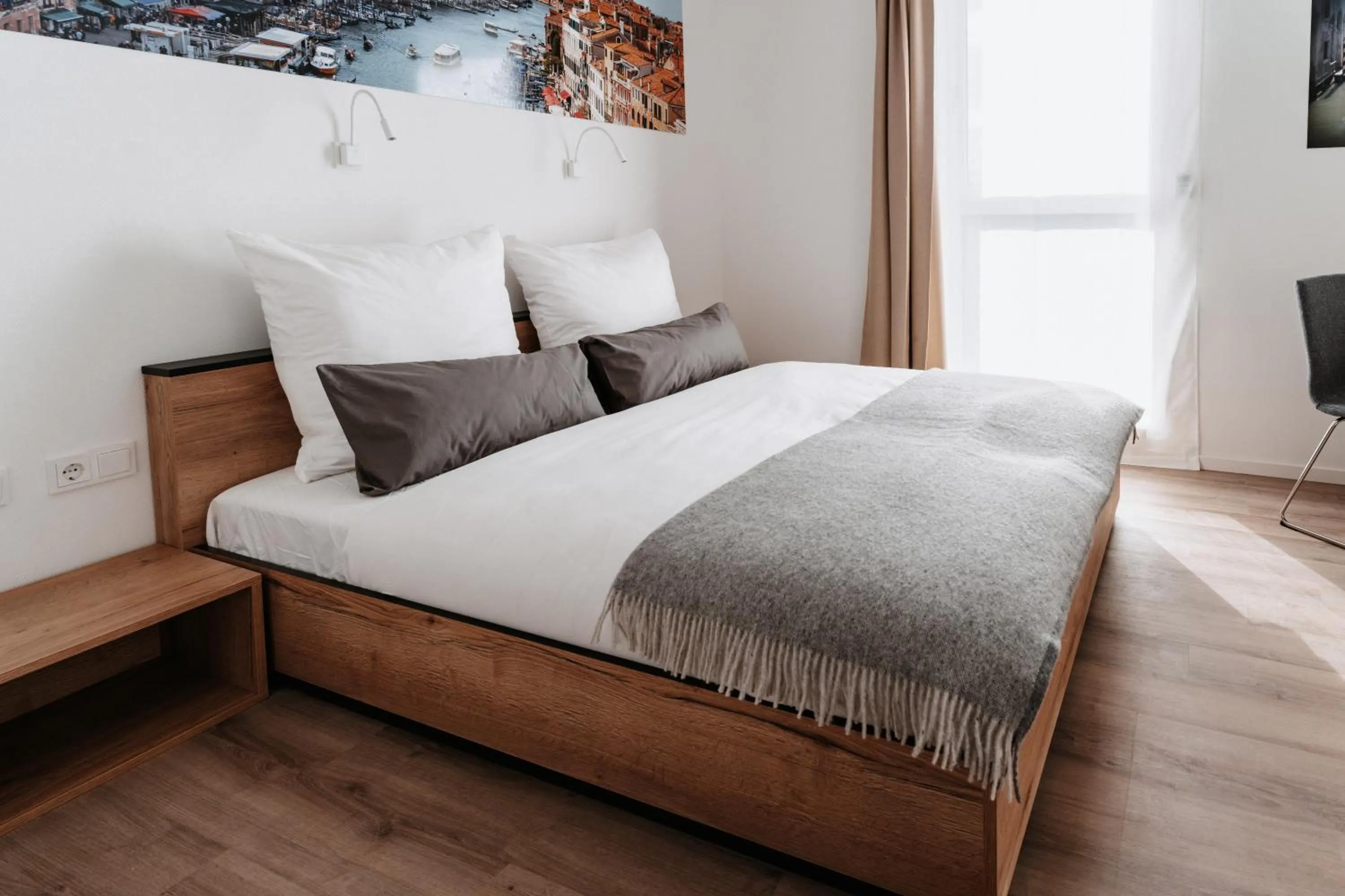 Bed in STEP INN The Fair Hotel