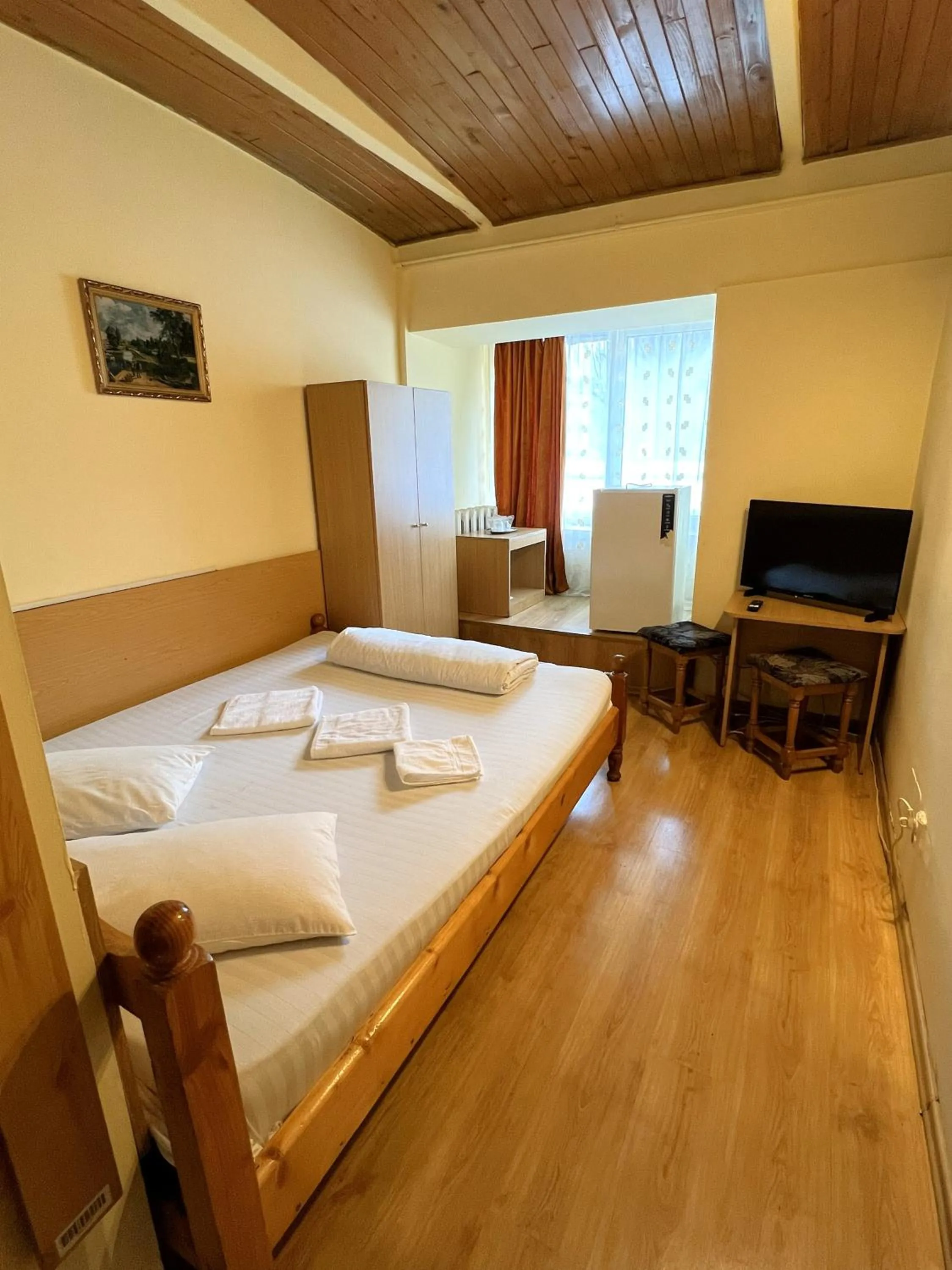 Bed in Hotel Decebal Bistrita