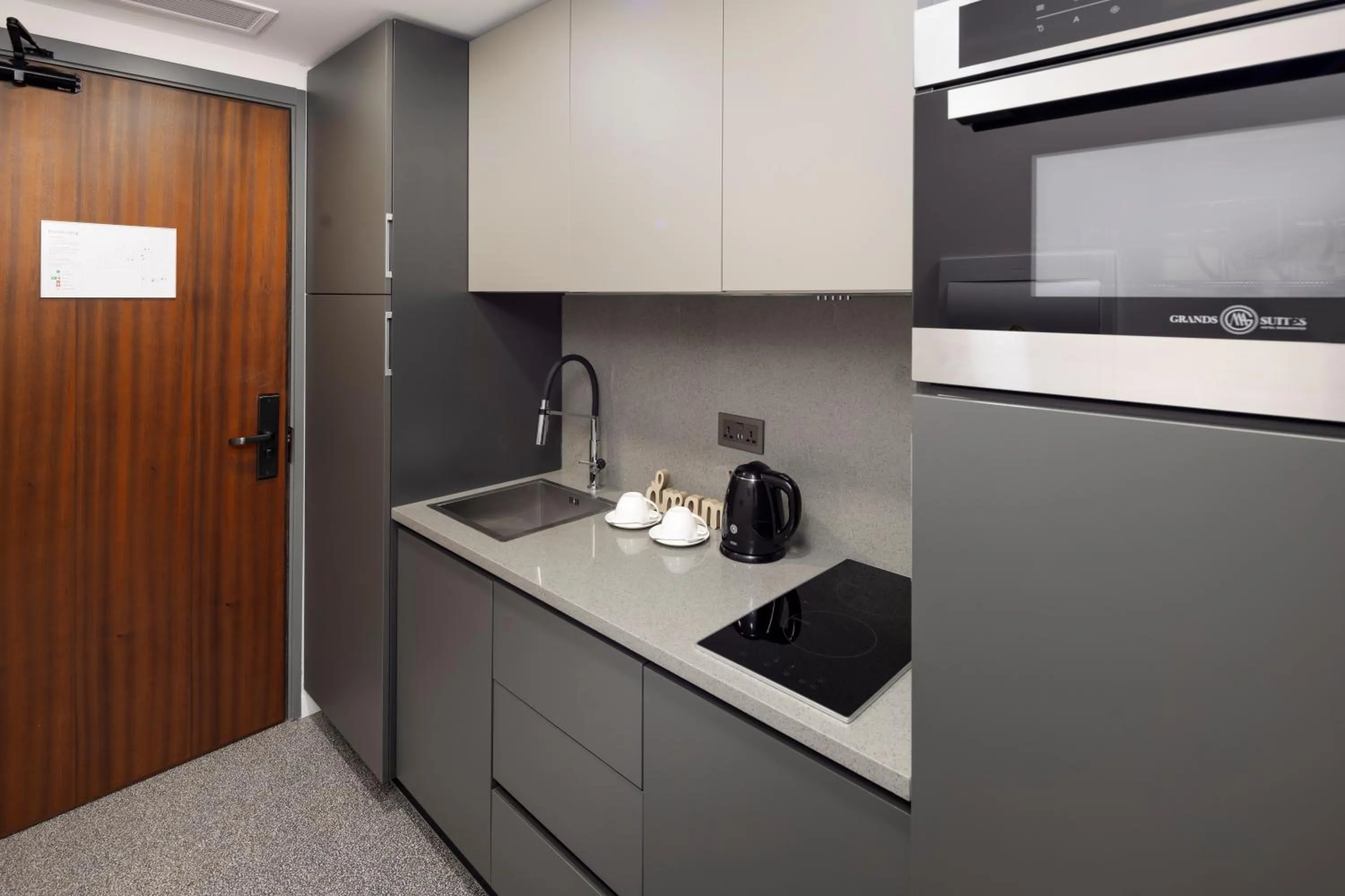 Kitchen or kitchenette in Grands Suites Hotel and Spa Sliema