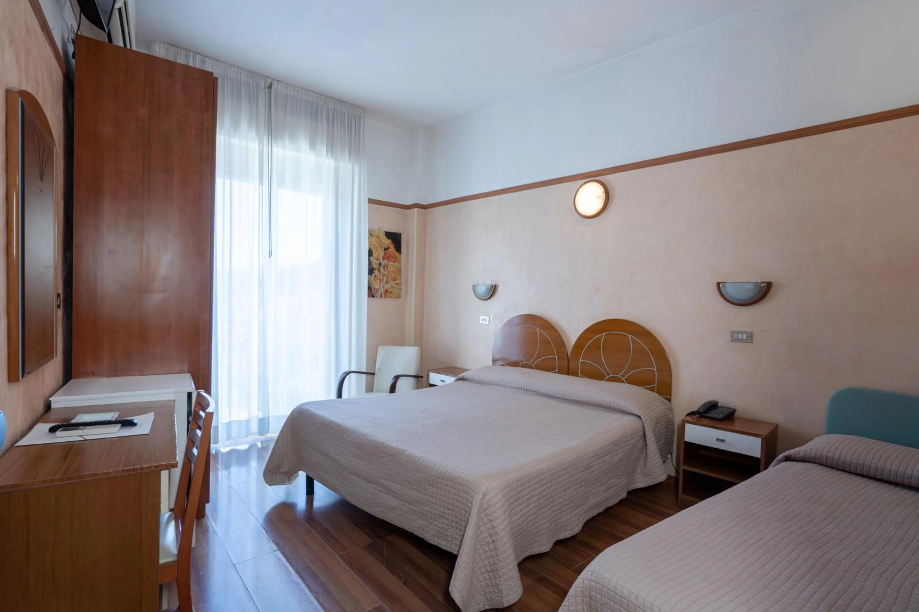 Photo of the whole room, Bed in Hotel Britannia Rimini Marina centro