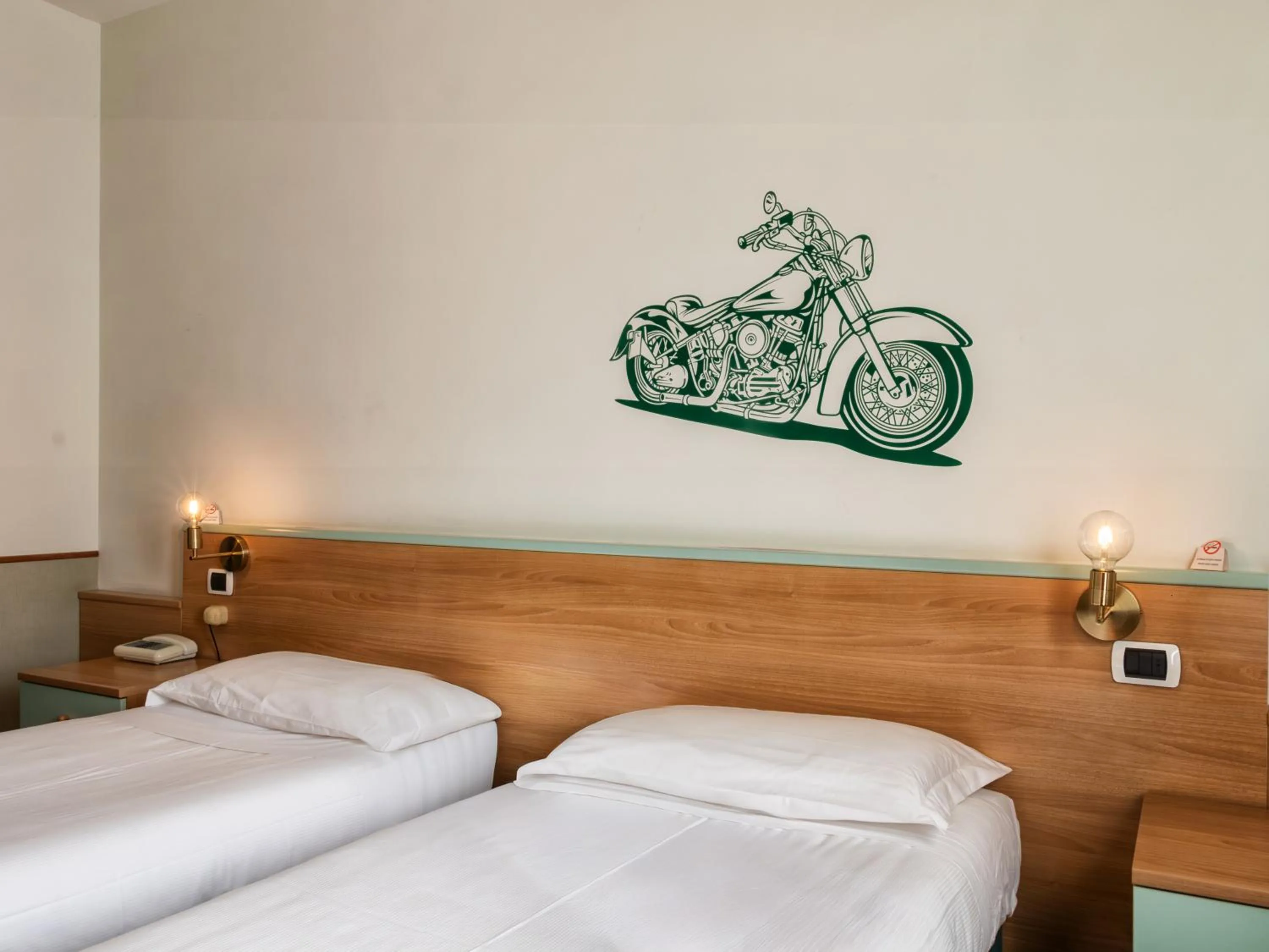 Bed in Hotel Napoleon Susa