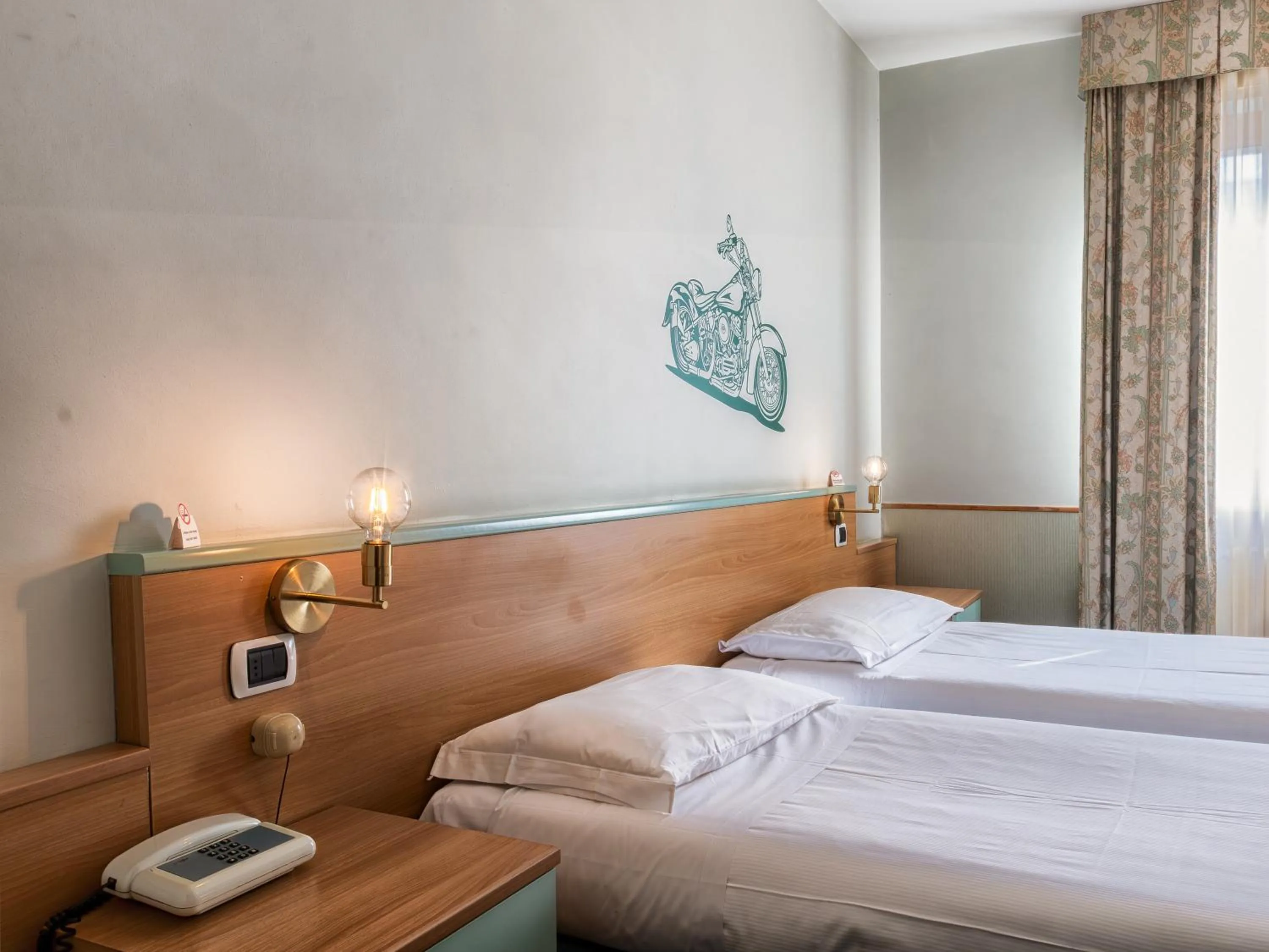 Bed in Hotel Napoleon Susa