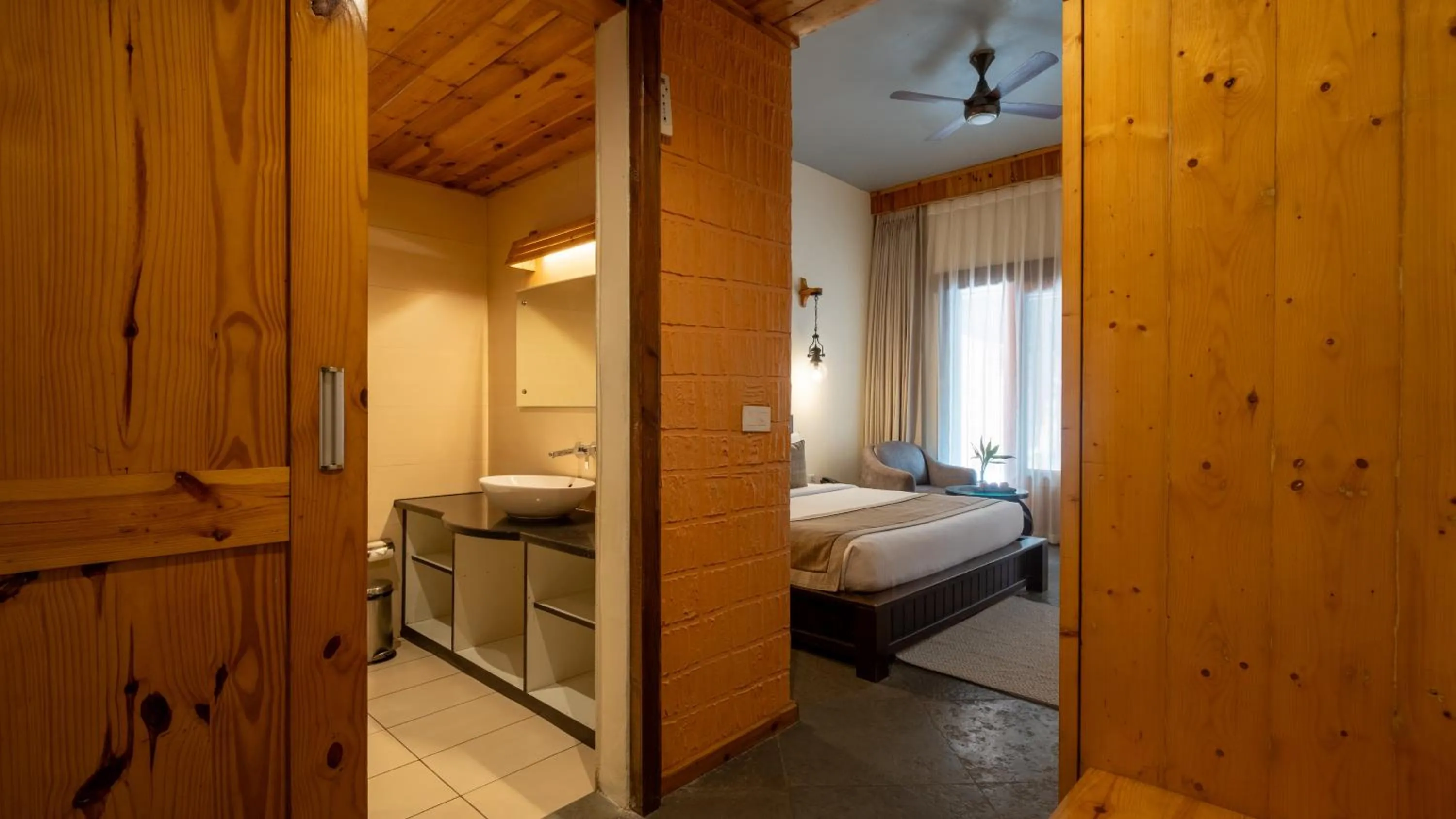 Bed in Tarangi Resort and Spa