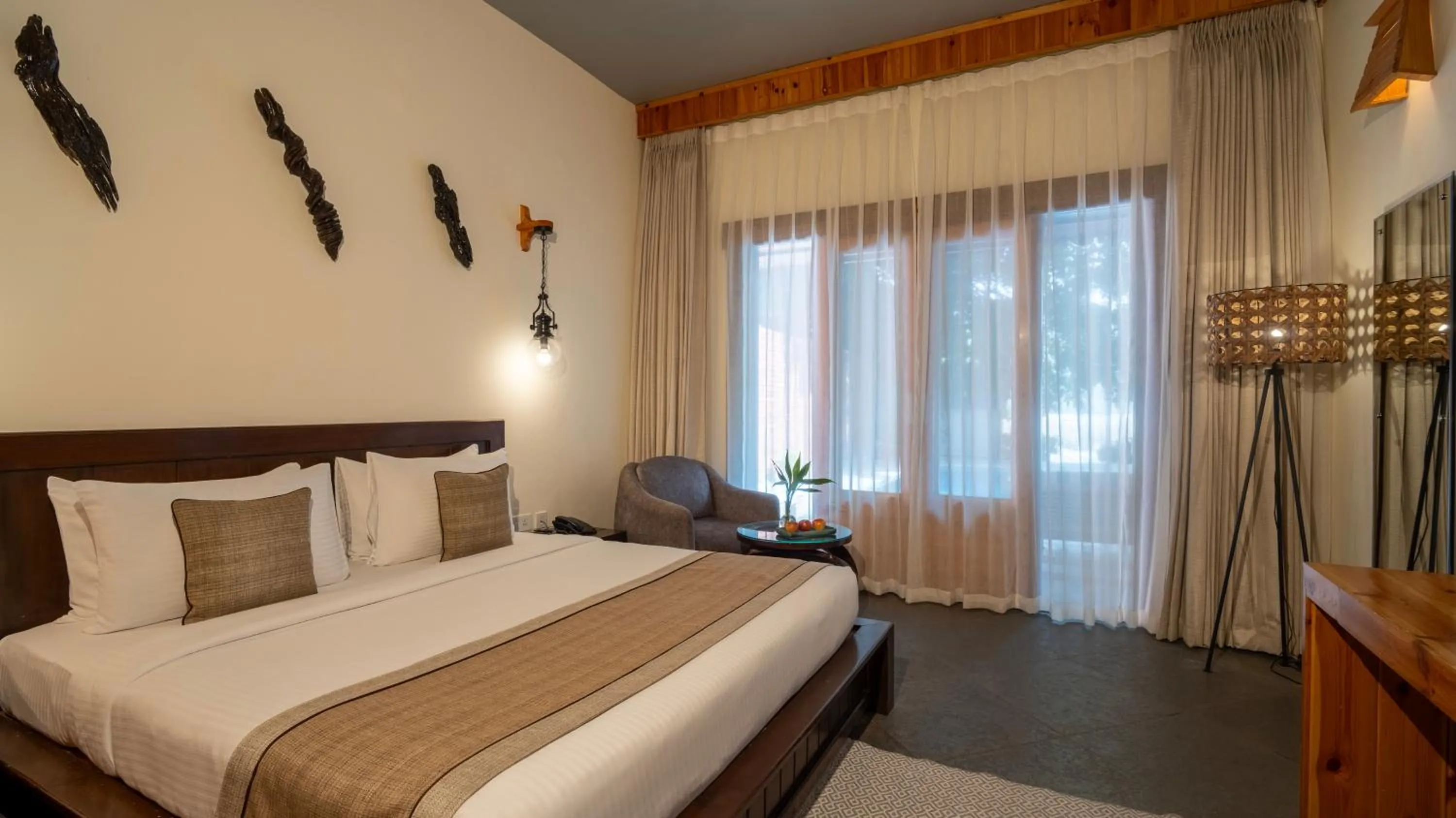 Photo of the whole room, Bed in Tarangi Resort and Spa