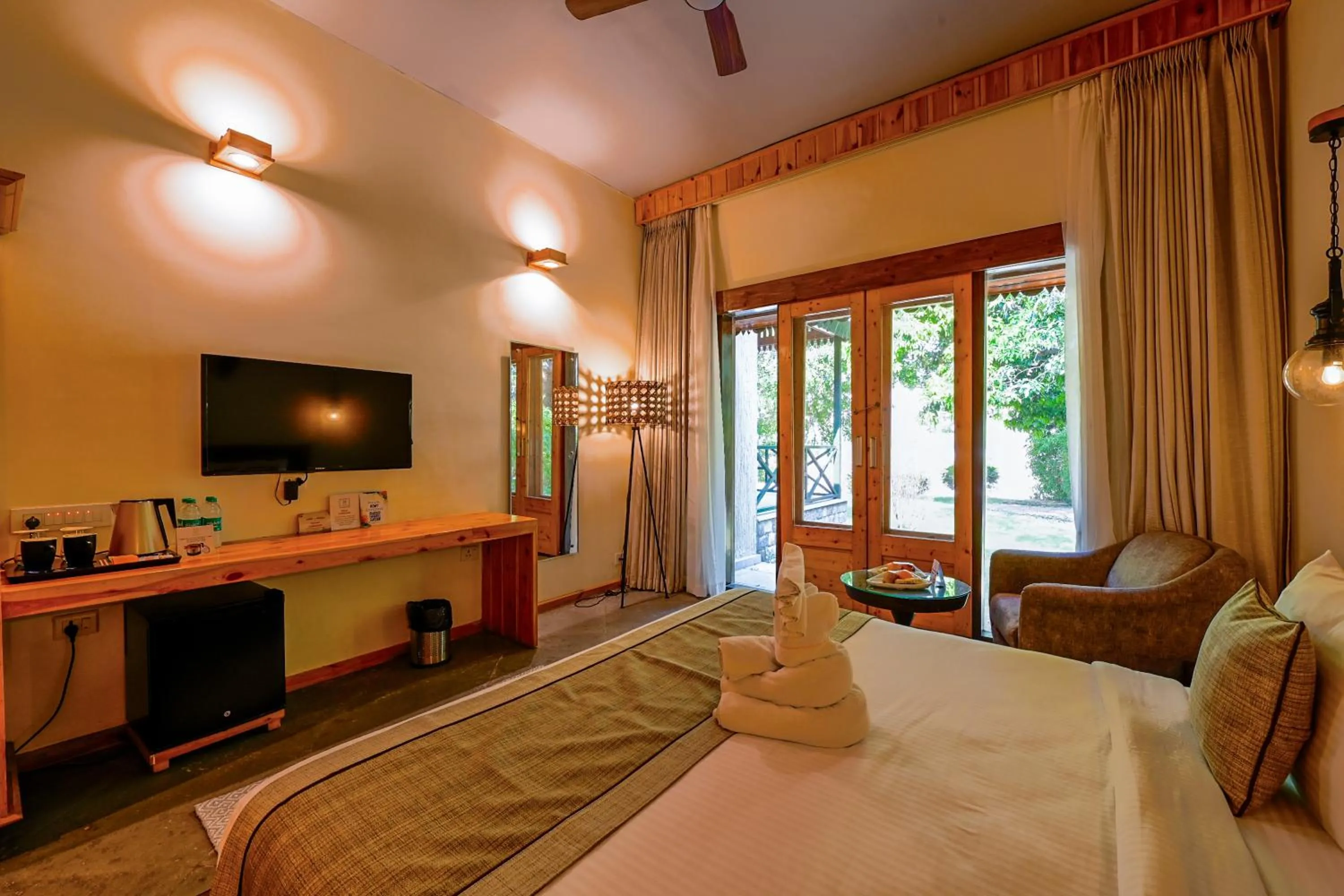 Photo of the whole room, Bed in Tarangi Resort and Spa