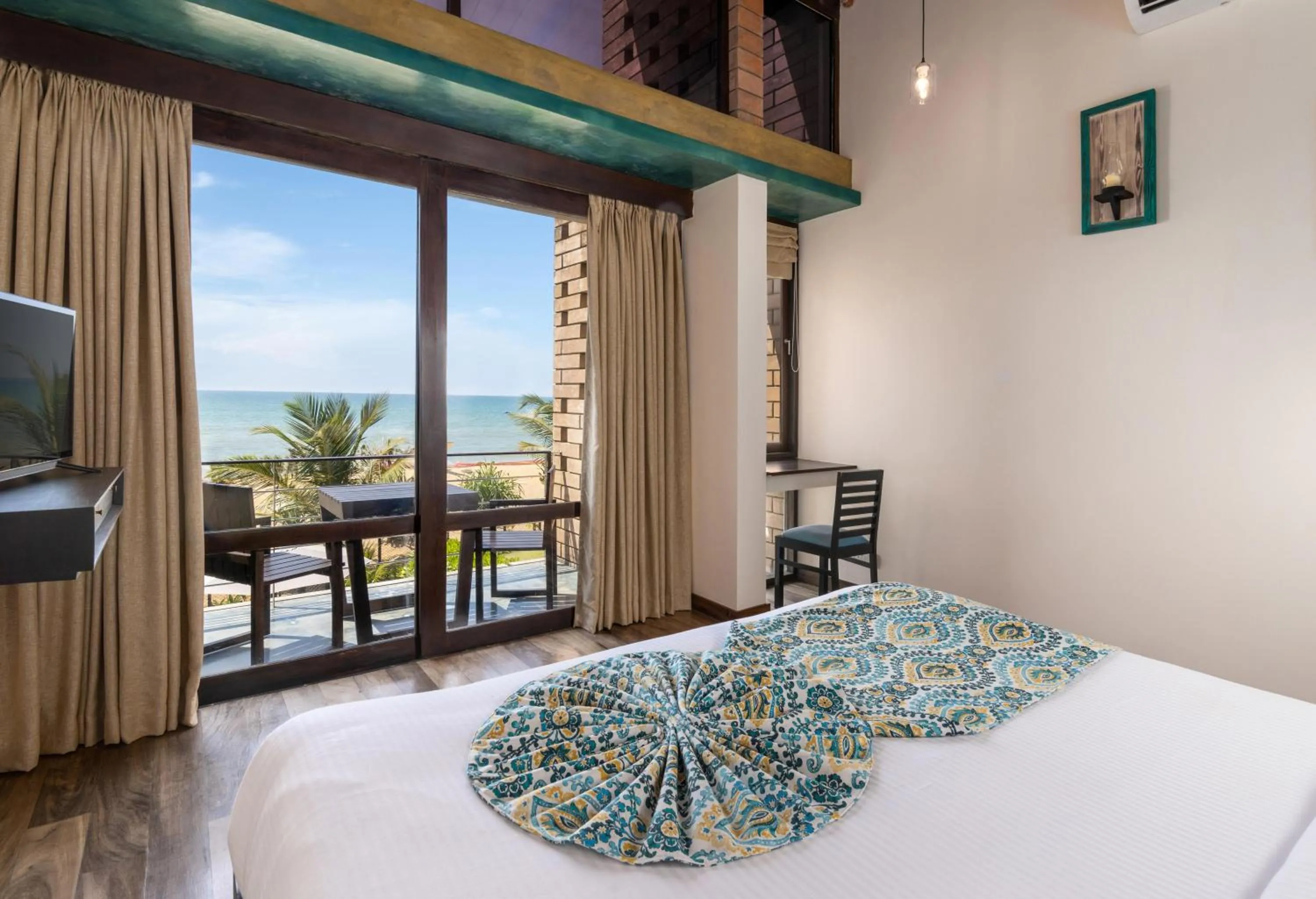 Bed in Inidi Leisure Luxury Villas