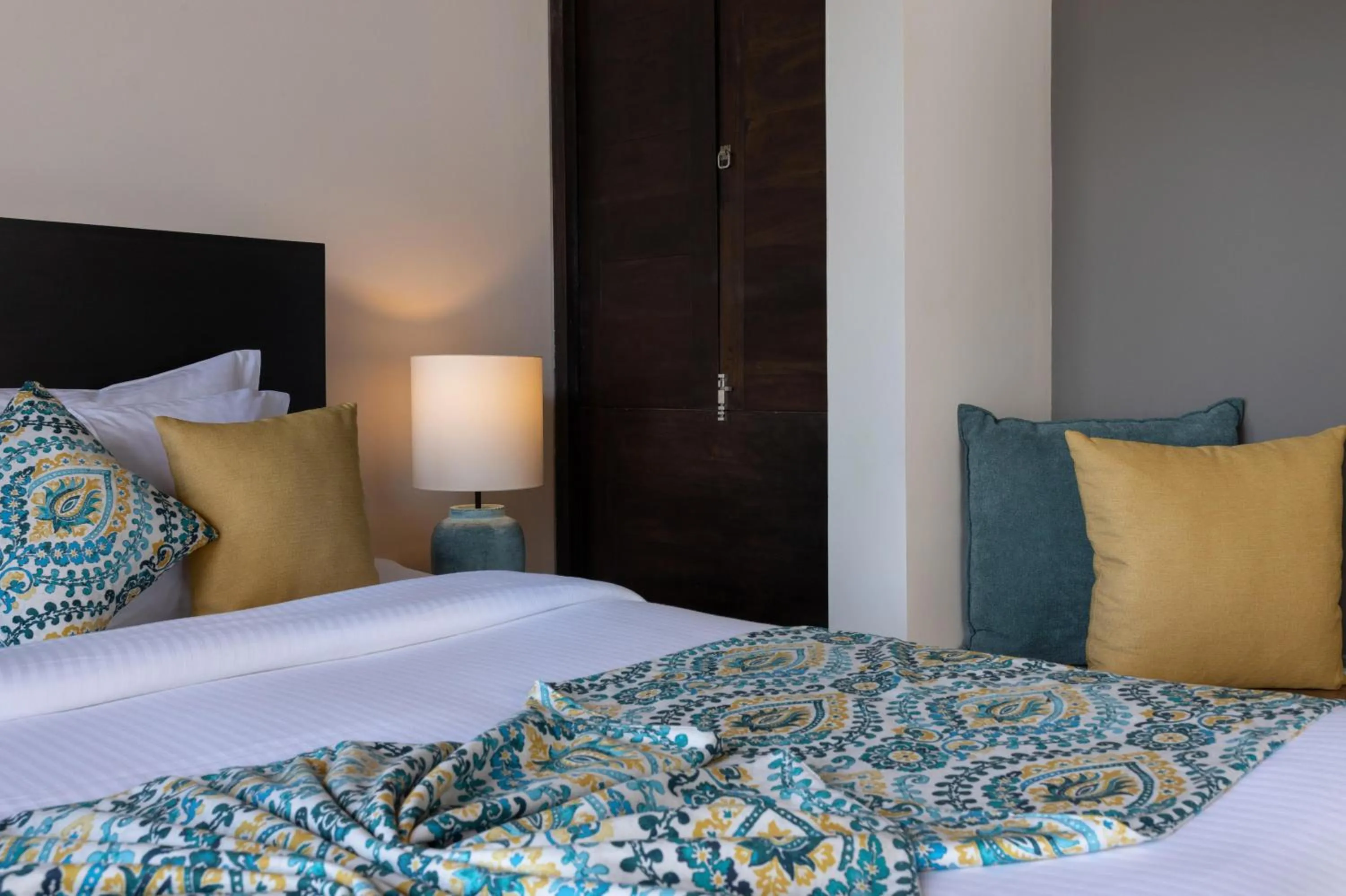 Bed in Inidi Leisure Luxury Villas