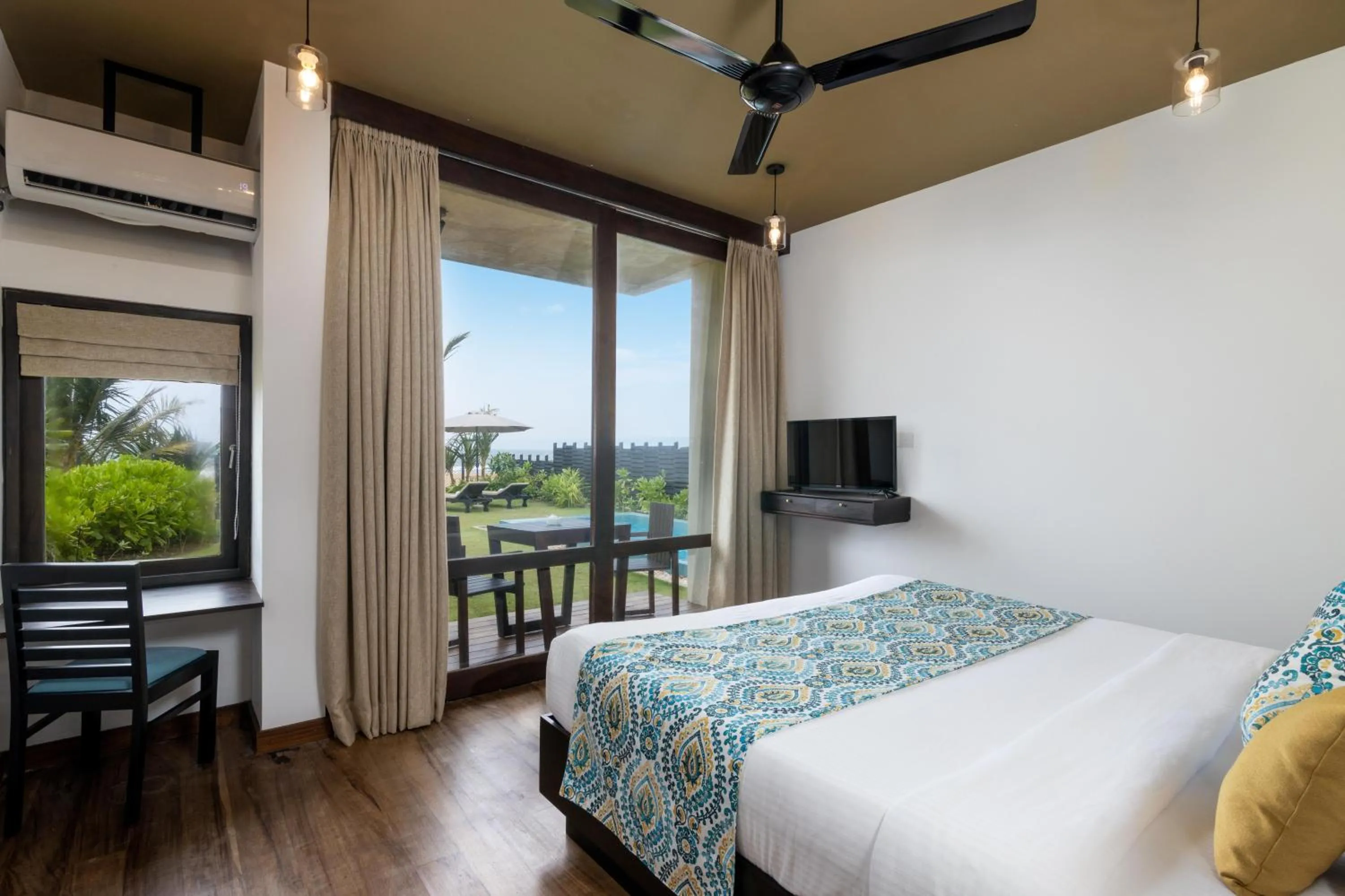 Bed in Inidi Leisure Luxury Villas