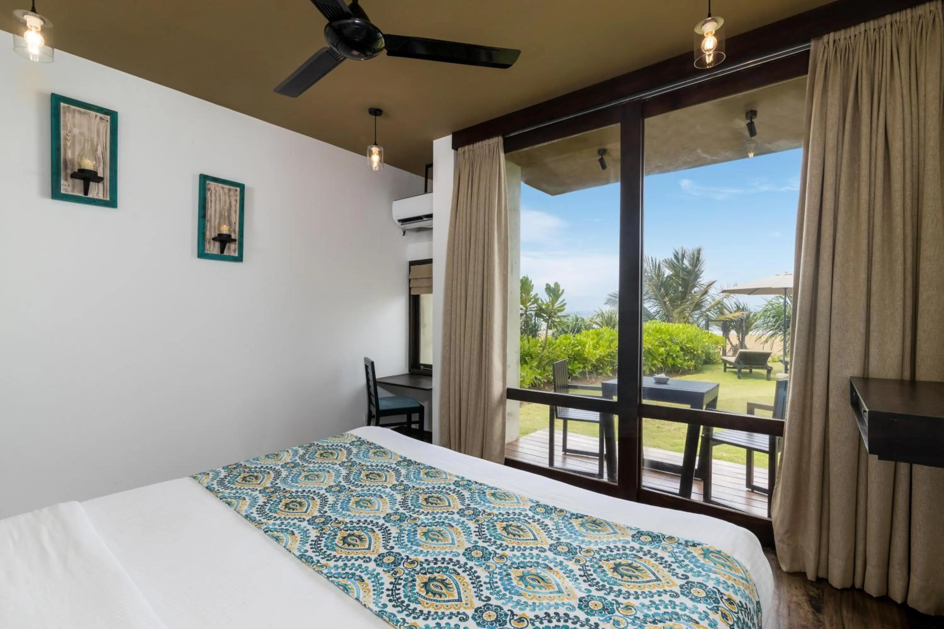 Bed in Inidi Leisure Luxury Villas