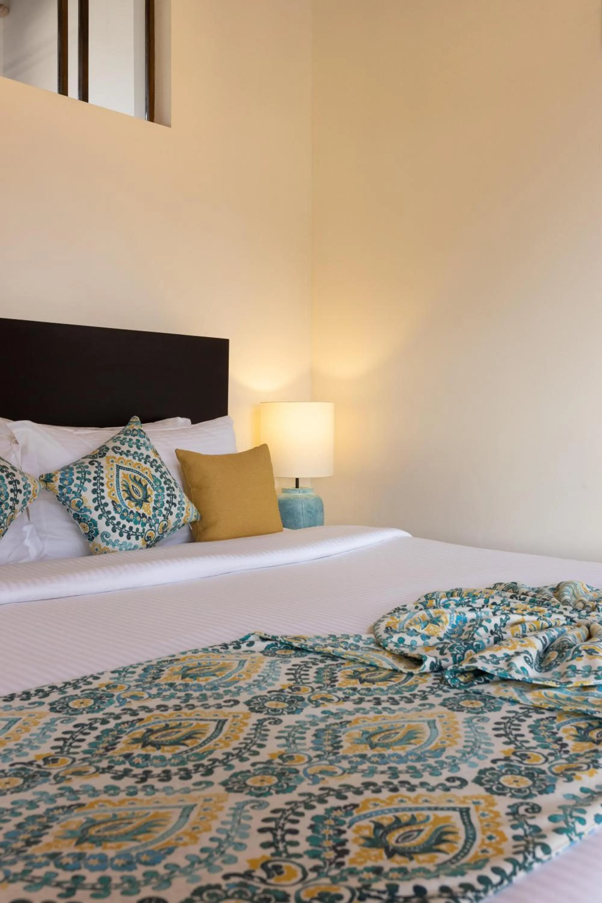 Bed in Inidi Leisure Luxury Villas