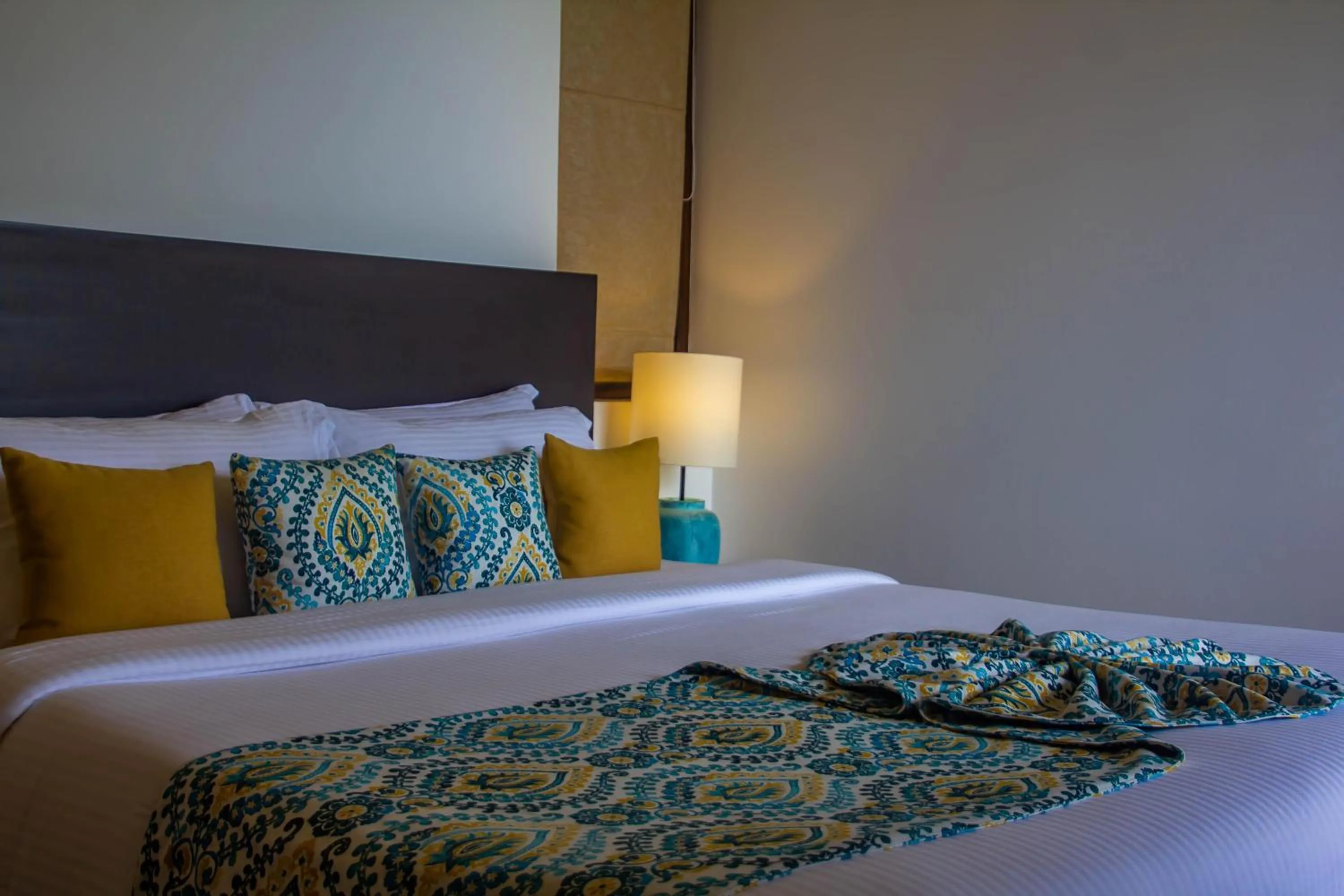Bed in Inidi Leisure Luxury Villas
