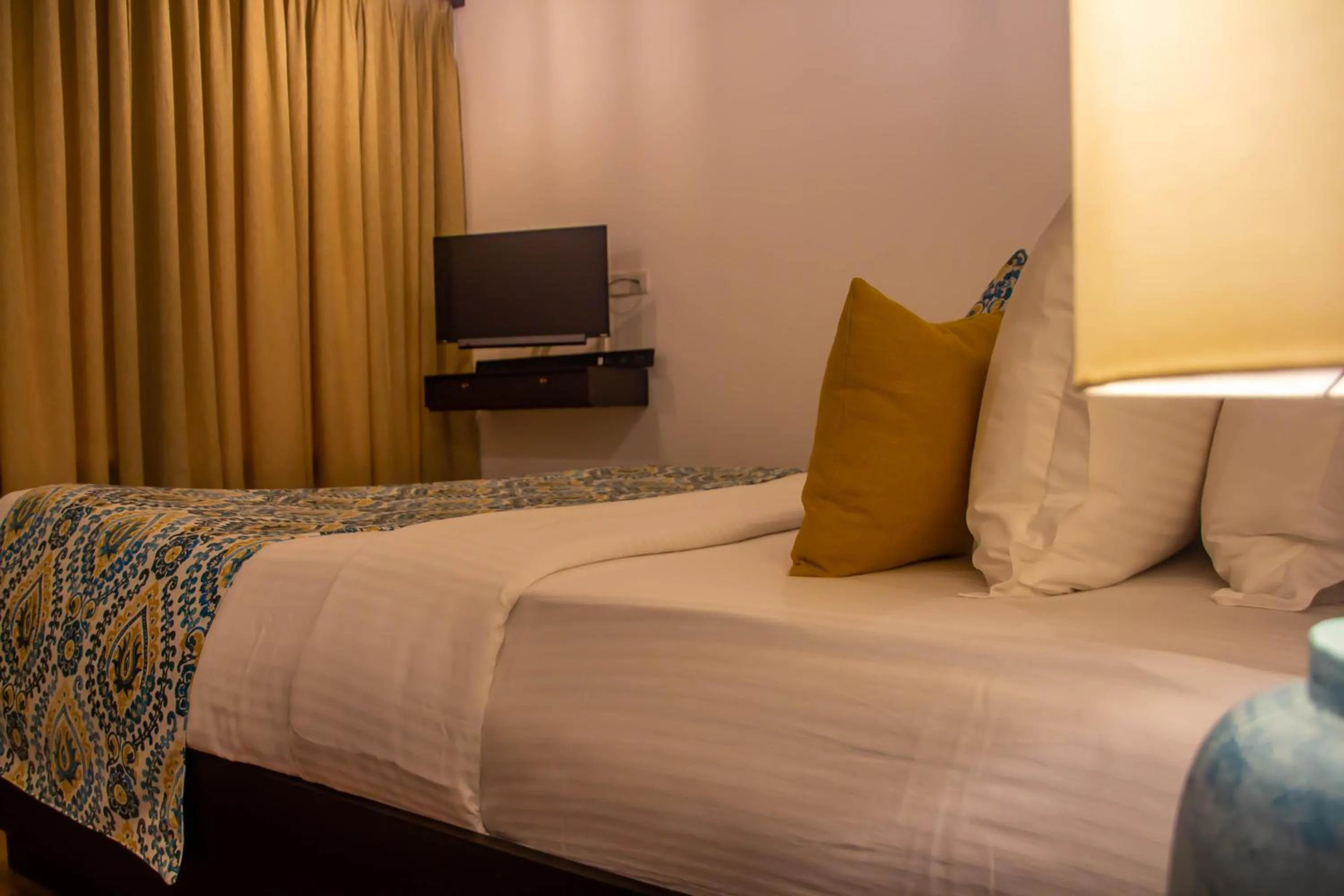 Bed in Inidi Leisure Luxury Villas