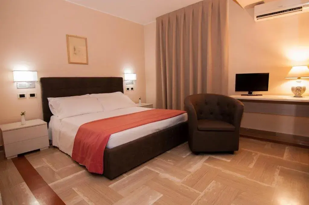 Bed in Hotel Pomara