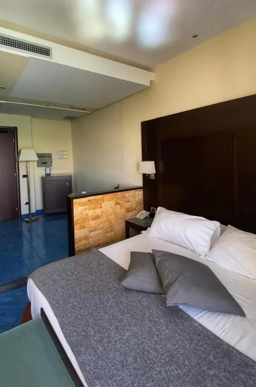 Decorative detail, Bed in Hotel La Lucertola Decorative detail, Bed in Hotel La Lucertola