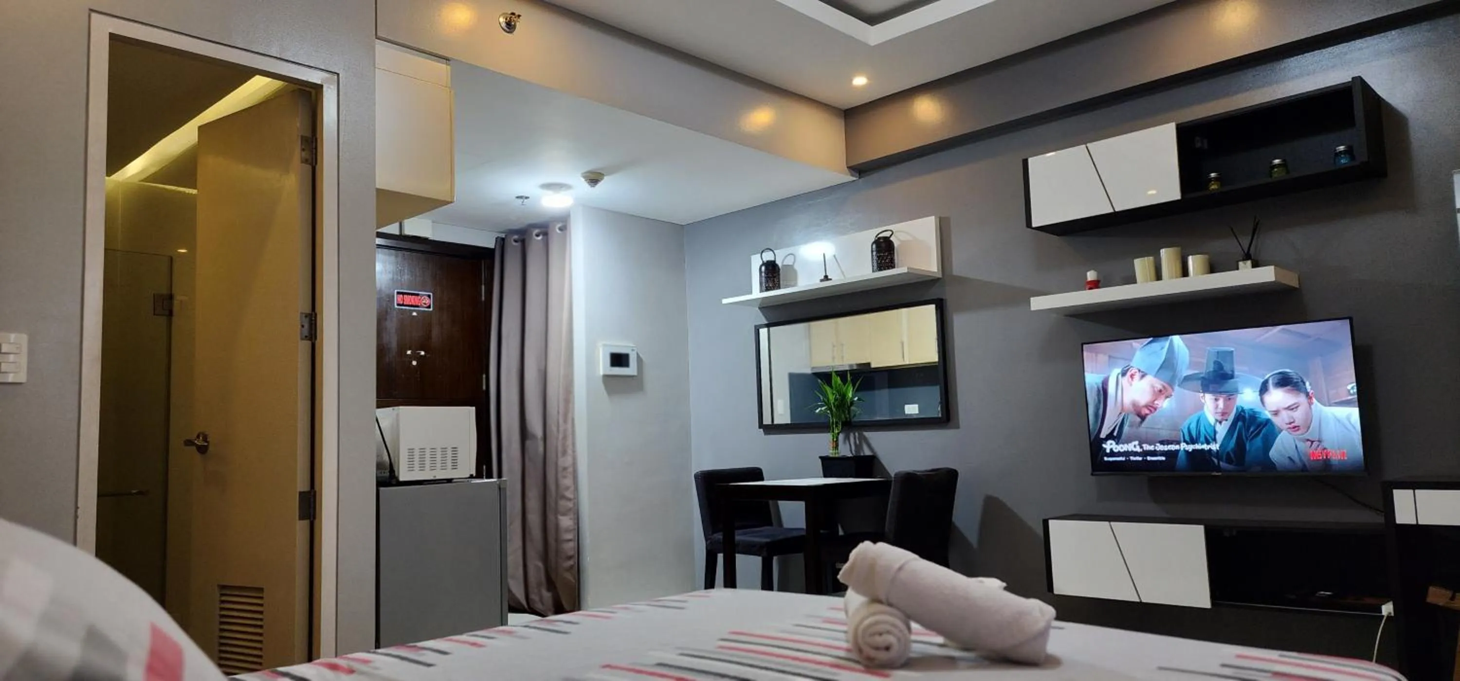 Bed in palm tree villas