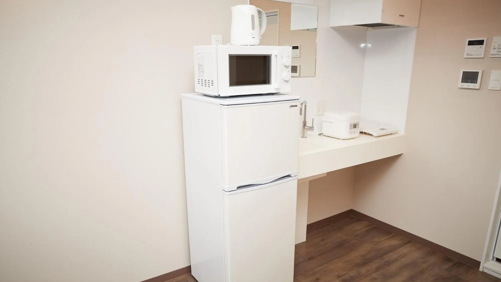 Kitchen or kitchenette in New Normal Condo in NAHA AIRPORT ニューノーマルコンドイン那覇エアポート