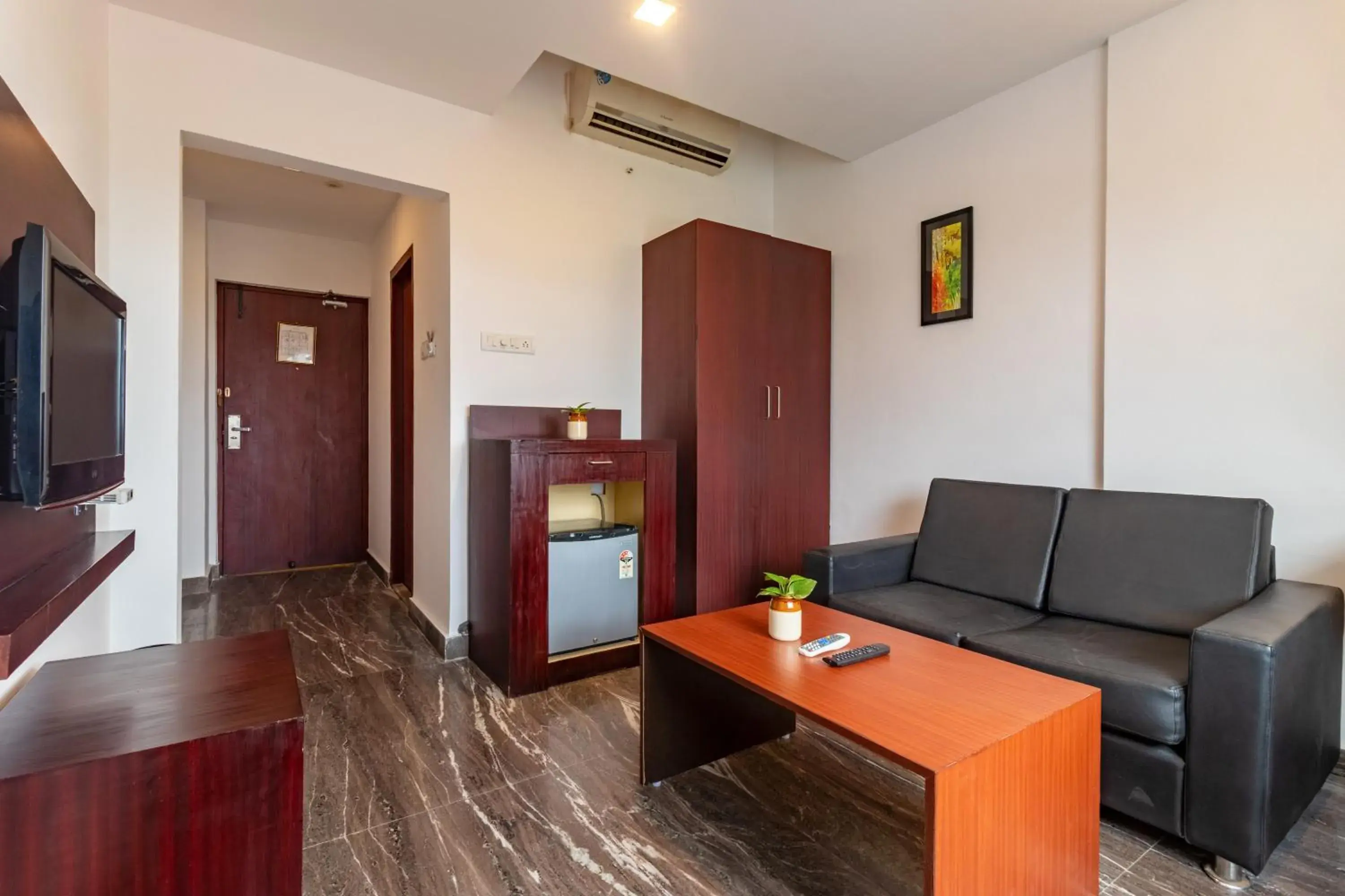 Living room in Zip By Spree Hotels Mangala Towers Thrissur Living room in Zip By Spree Hotels Mangala Towers Thrissur