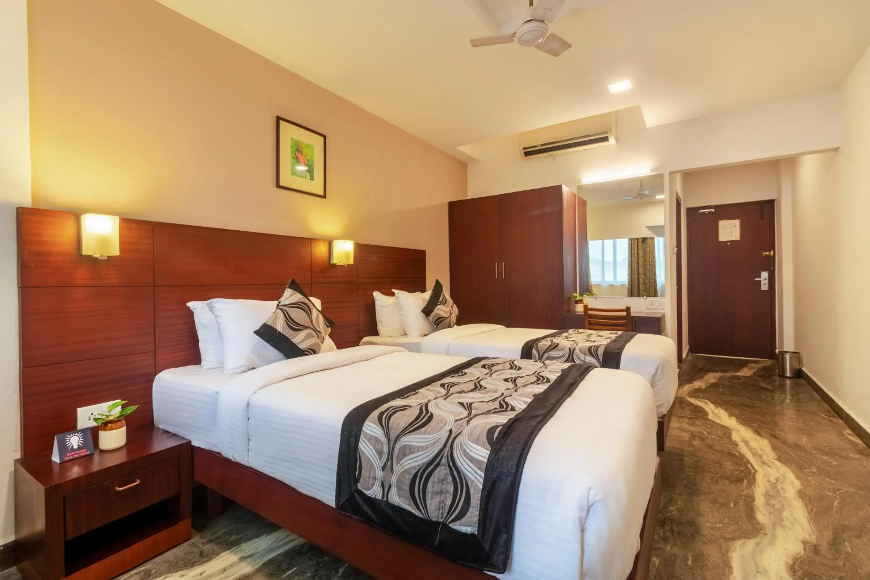 Photo of the whole room, Bed in Zip By Spree Hotels Mangala Towers Thrissur Photo of the whole room, Bed in Zip By Spree Hotels Mangala Towers Thrissur